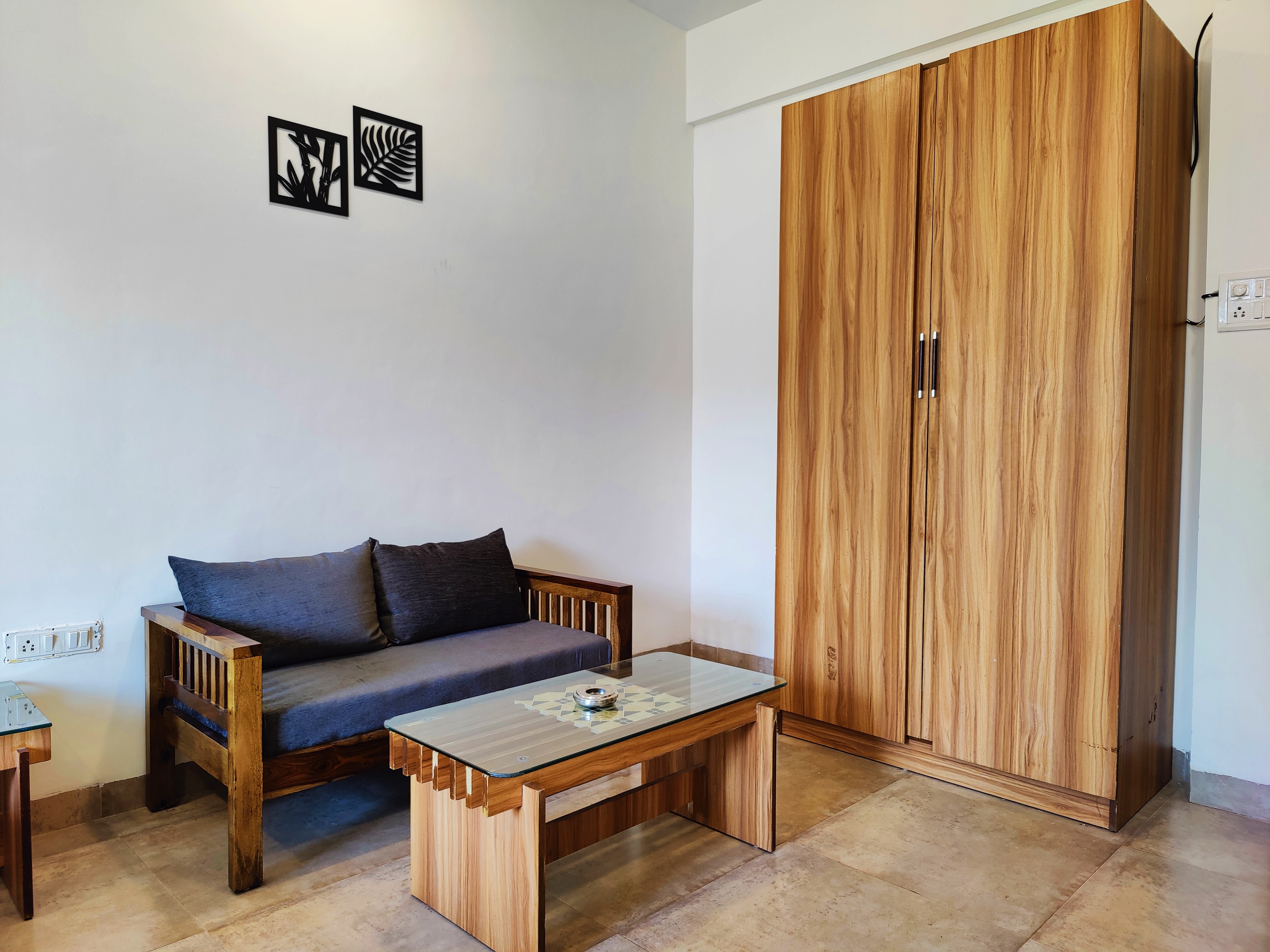 Triple Sharing Studio Family Room - Tap to explore photos