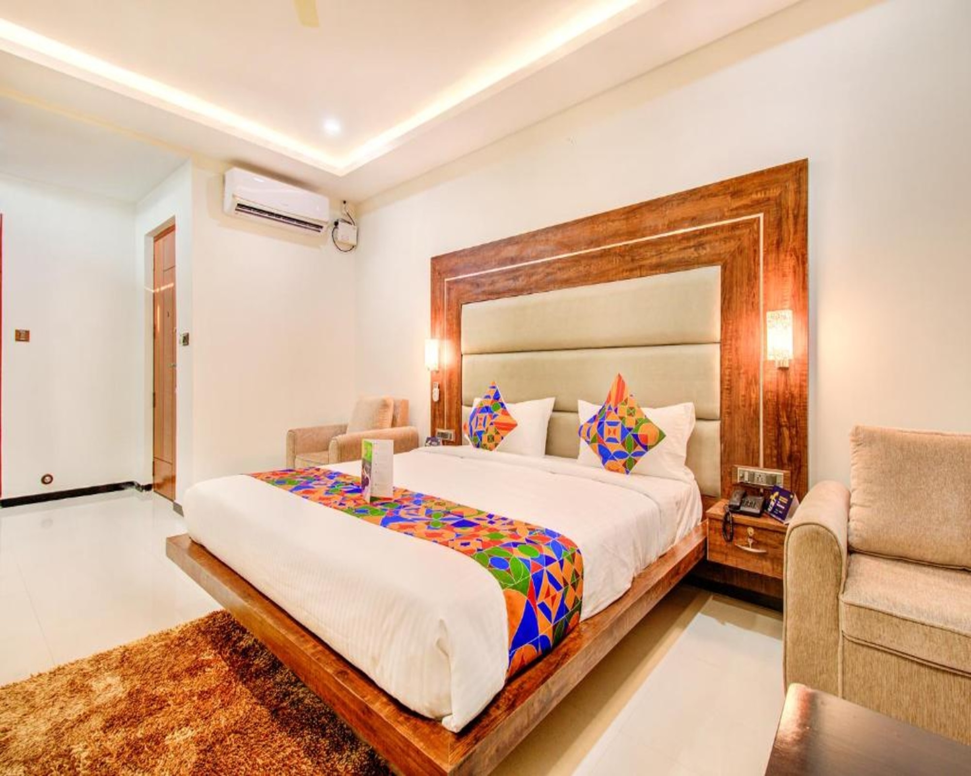 FabHotel The Royal Suites - Nr. Gopalan innovation mall - Tap to explore photos