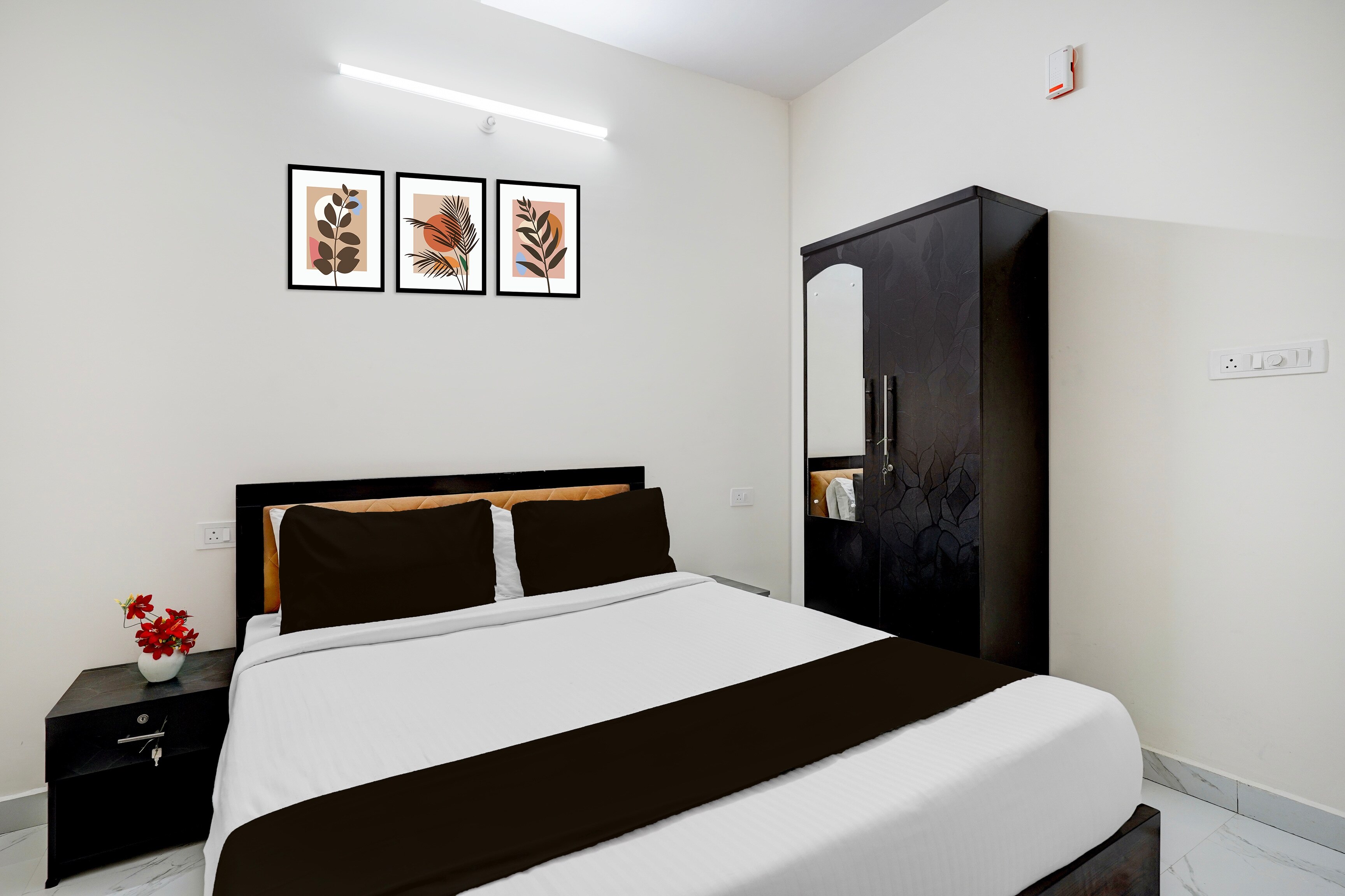 Hotel O Comfort Suites - Tap to explore photos