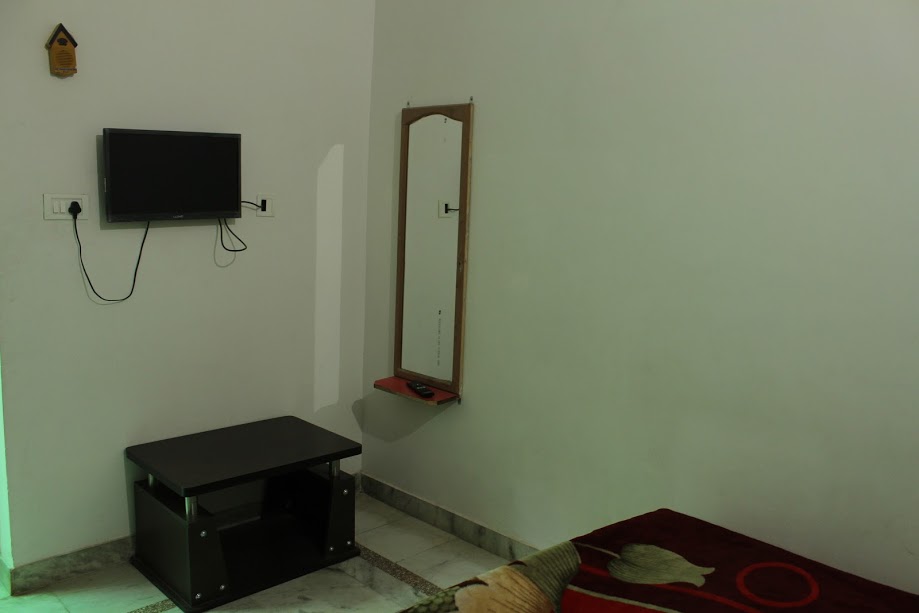 Shri Radhey Guest House - Tap to explore photos