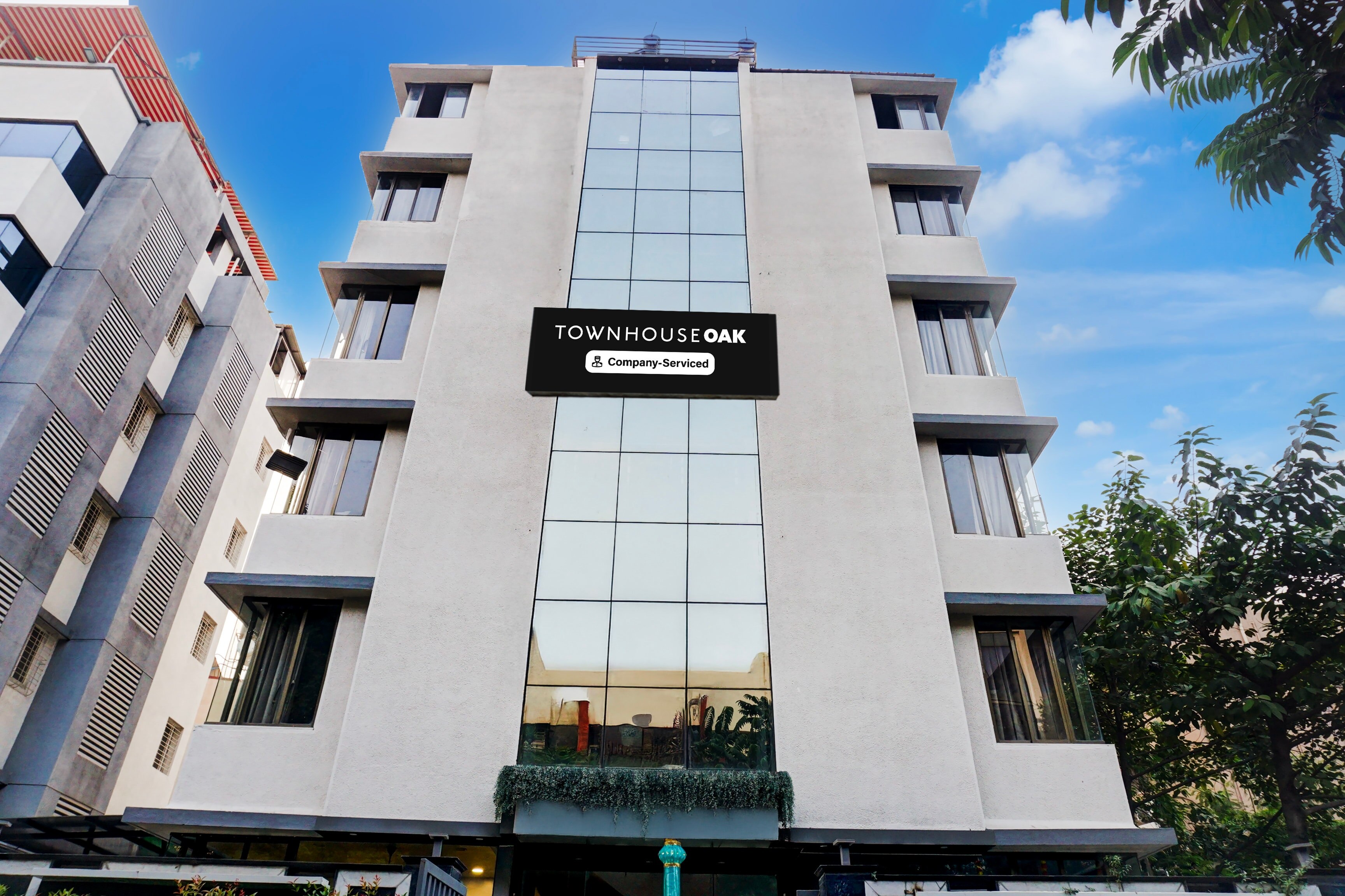 Super Townhouse Oak Viman Nagar Formerly Kuber Inn - Tap to explore photos