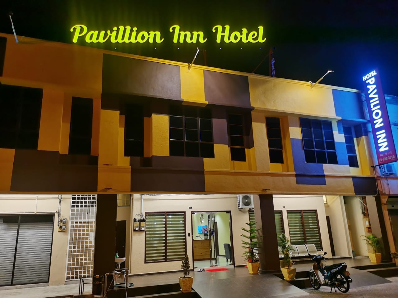 OYO 90883 Pavilion Inn Hotel - Tap to explore photos