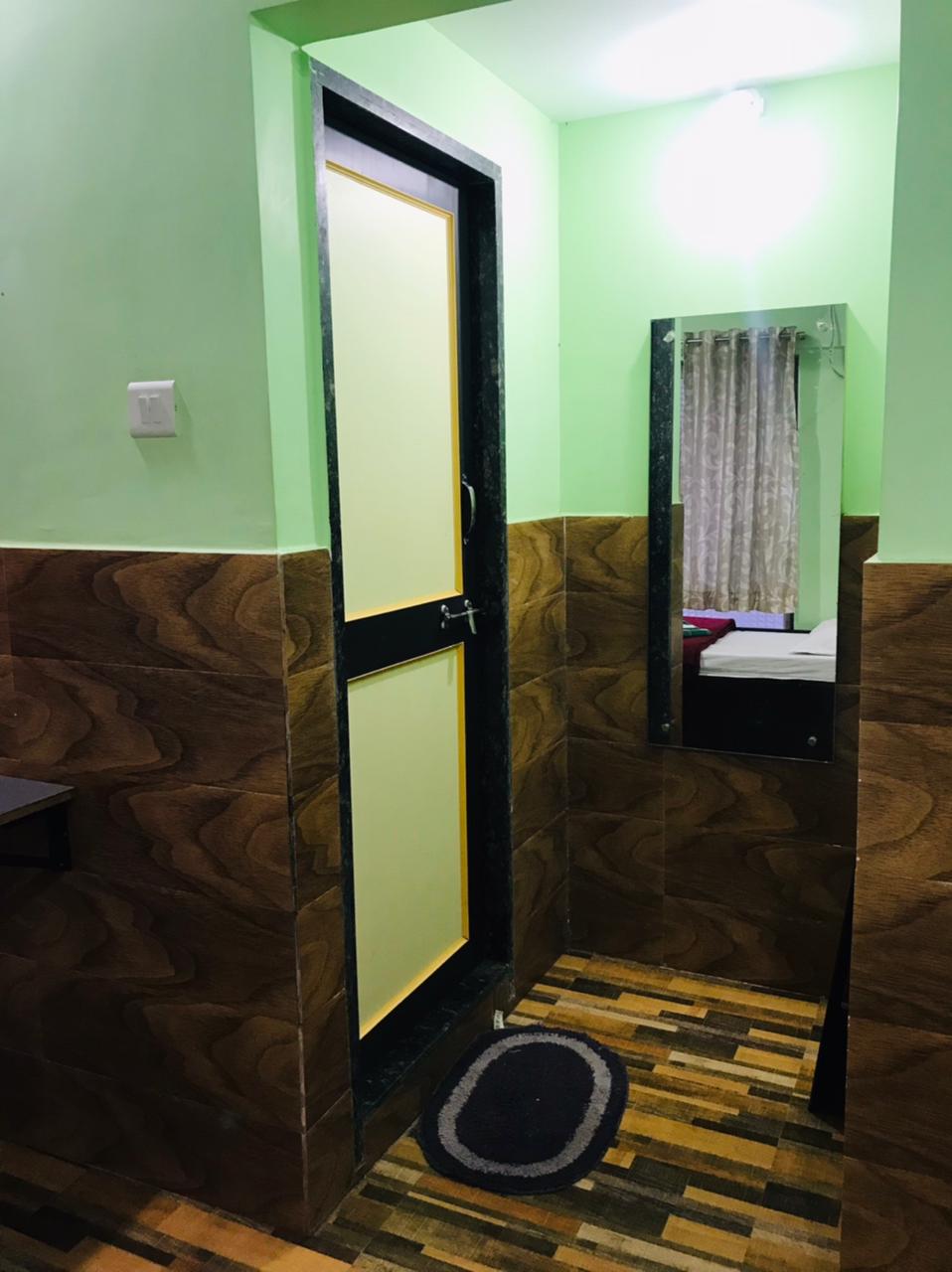 Chinmay Lodging - Tap to explore photos