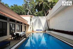 StayVista at Scarlett @ La Bougainvillea - Heritage Home with Complimentary Cook, Goa