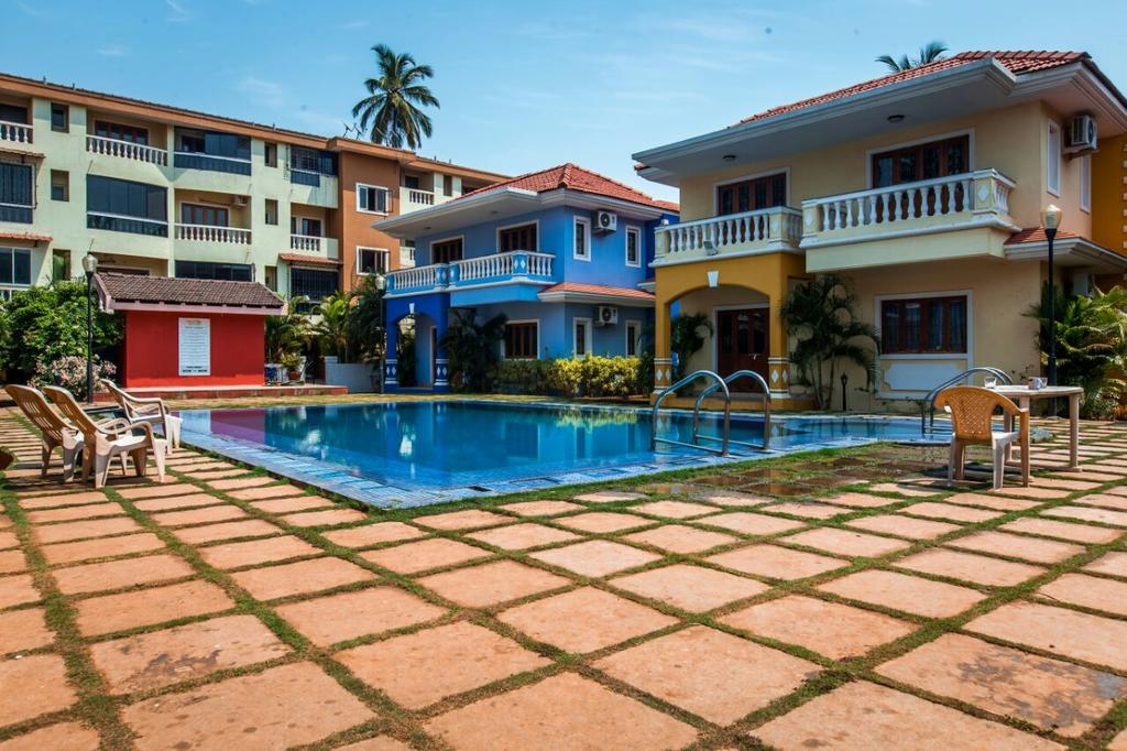 Charu Holiday Homes -1 BHK Apartment - Tap to explore photos
