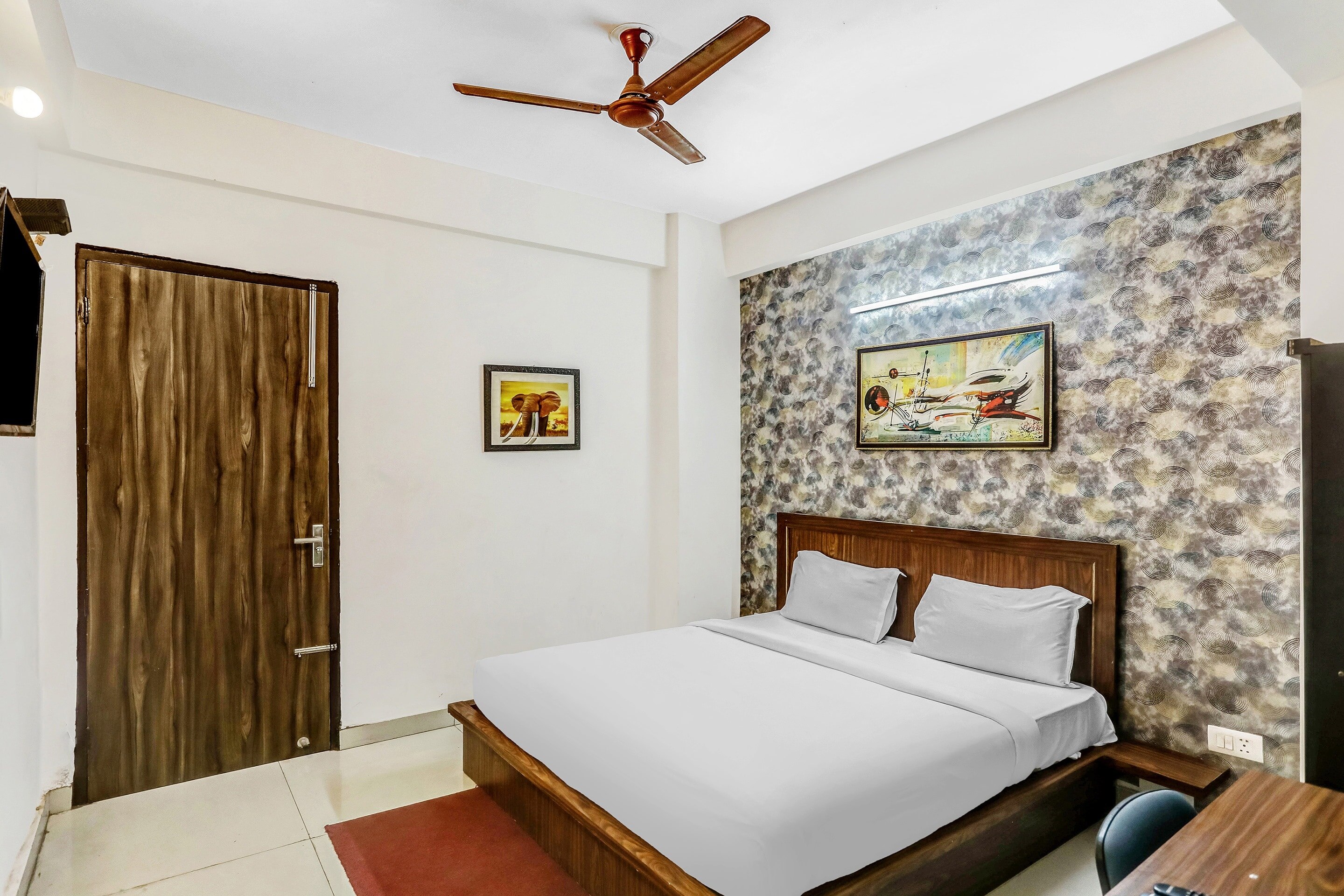 Hotel O Relax Suites - Tap to explore photos