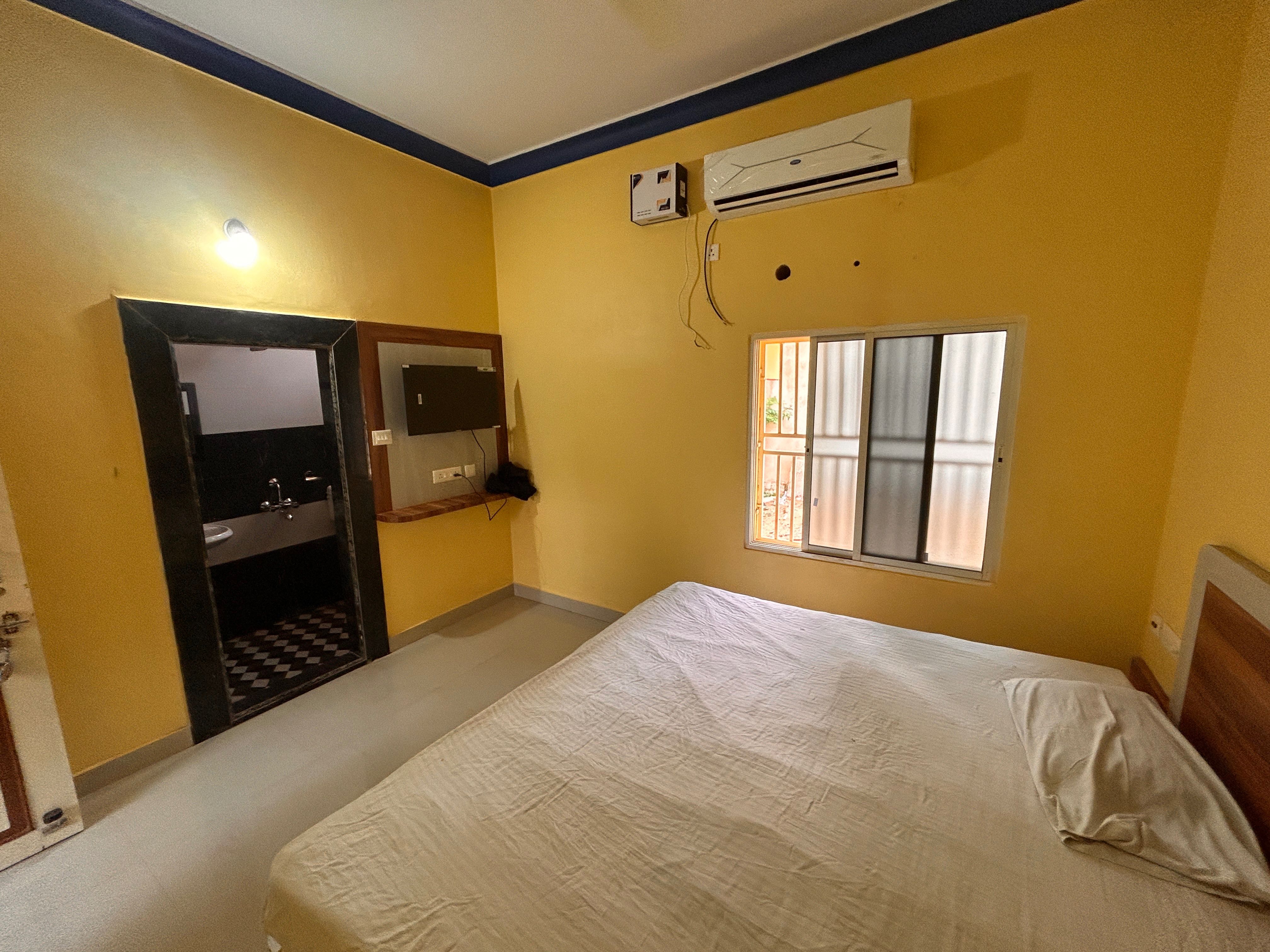 Hotel O OMM Guest house - Tap to explore photos