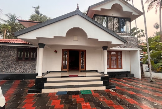 Room is a Homestay by Manasam Homes