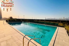 Luxury Living at Cloud Tower JVT with Pool Gym & Sports Facilities, Dubai