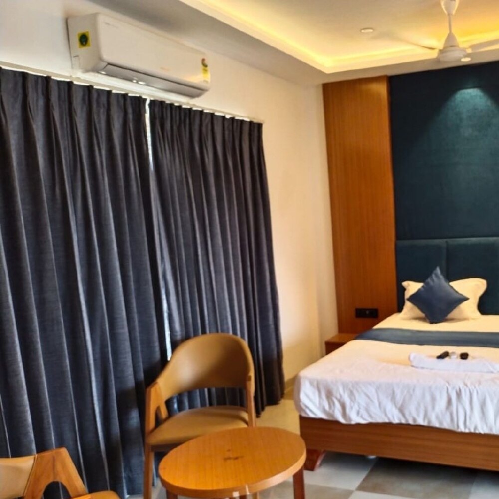 Hotel Suryoday & Rooms - Tap to explore photos