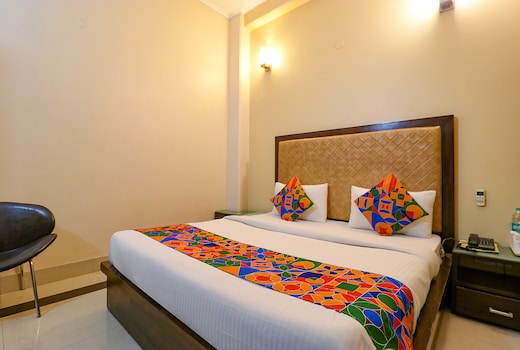 FabHotel Happy Residency