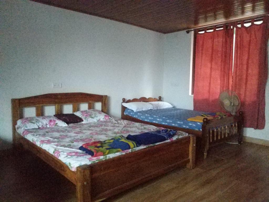 The Backpacker's Homestay - Coorg - Tap to explore photos