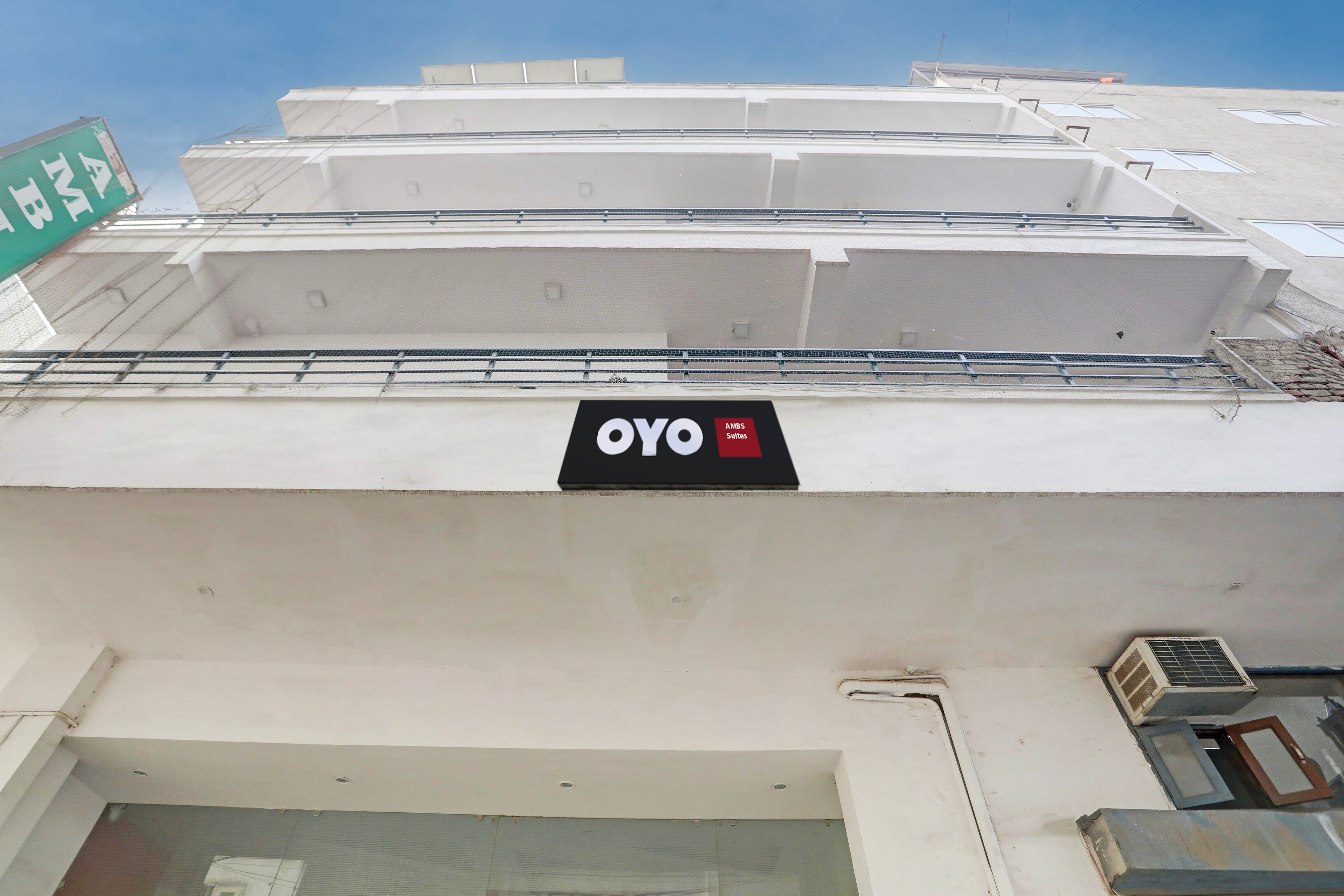 Hotel O AMBS SUITES - Tap to explore photos
