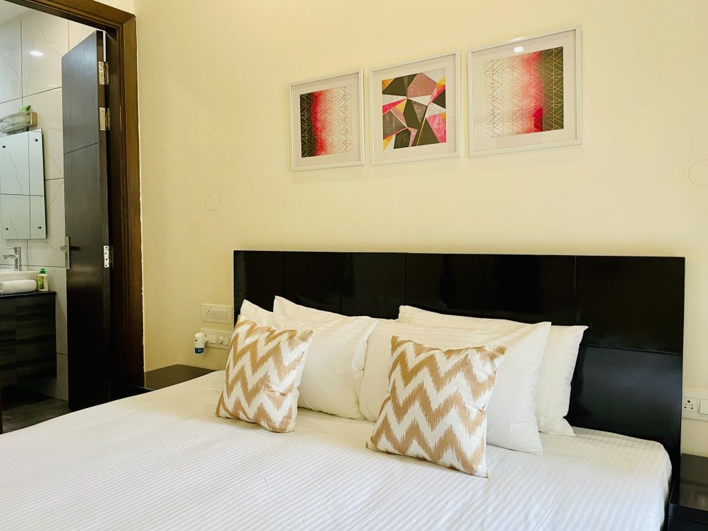 Olive Standard Room DLF Phase 2 - Tap to explore photos