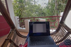Luxurious room in Serene BEML layout with balcony, Bangalore