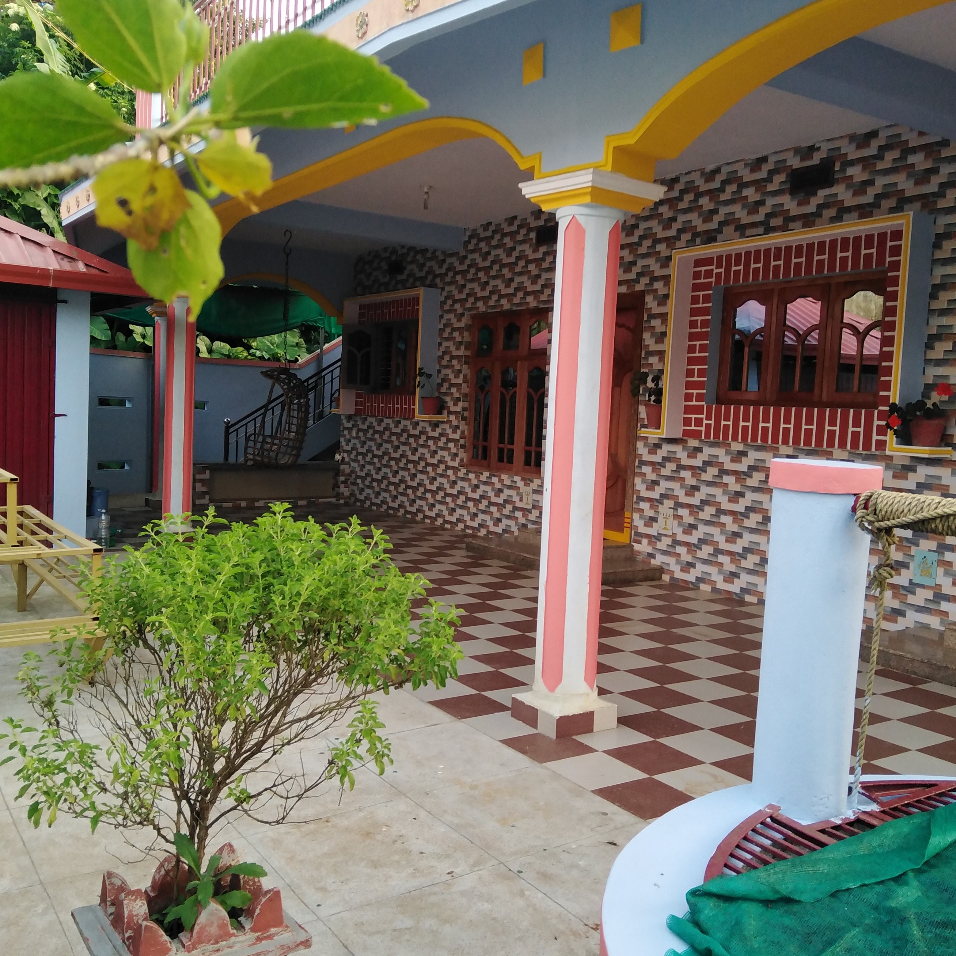 Coorg Mango Villa home - Tap to explore photos