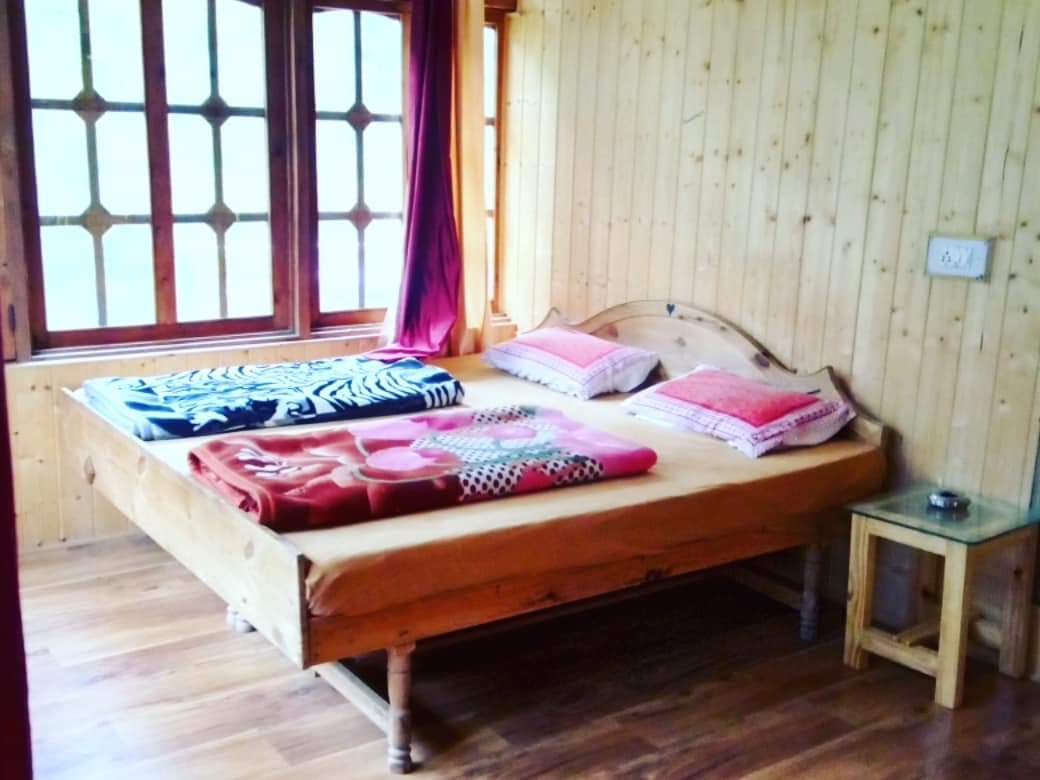 Kasol Wooden Cottages & Camp - Tap to explore photos