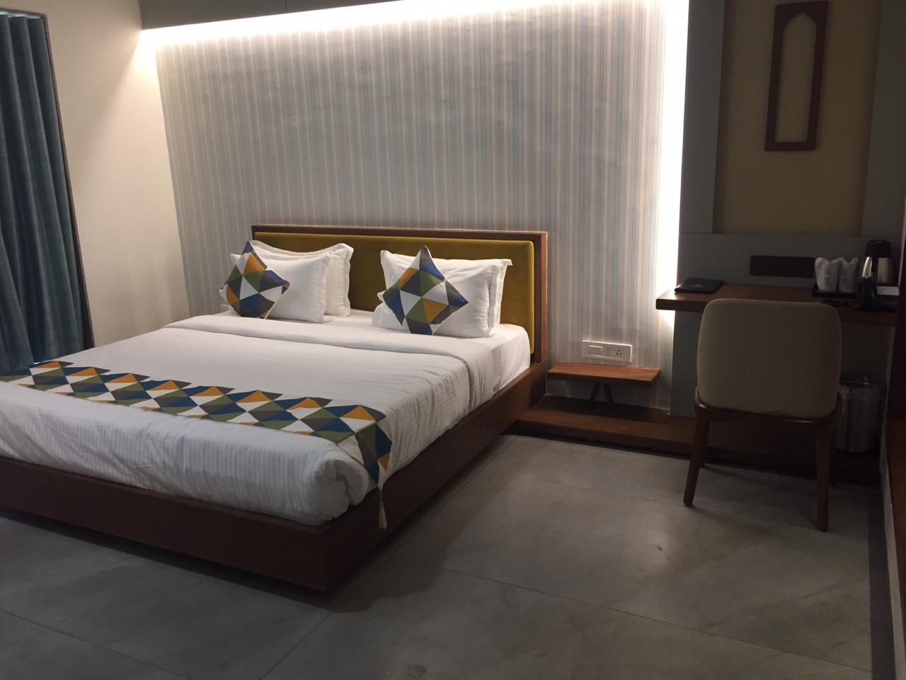Hotel The Pramukh by Shivalaya Darshanam - Tap to explore photos