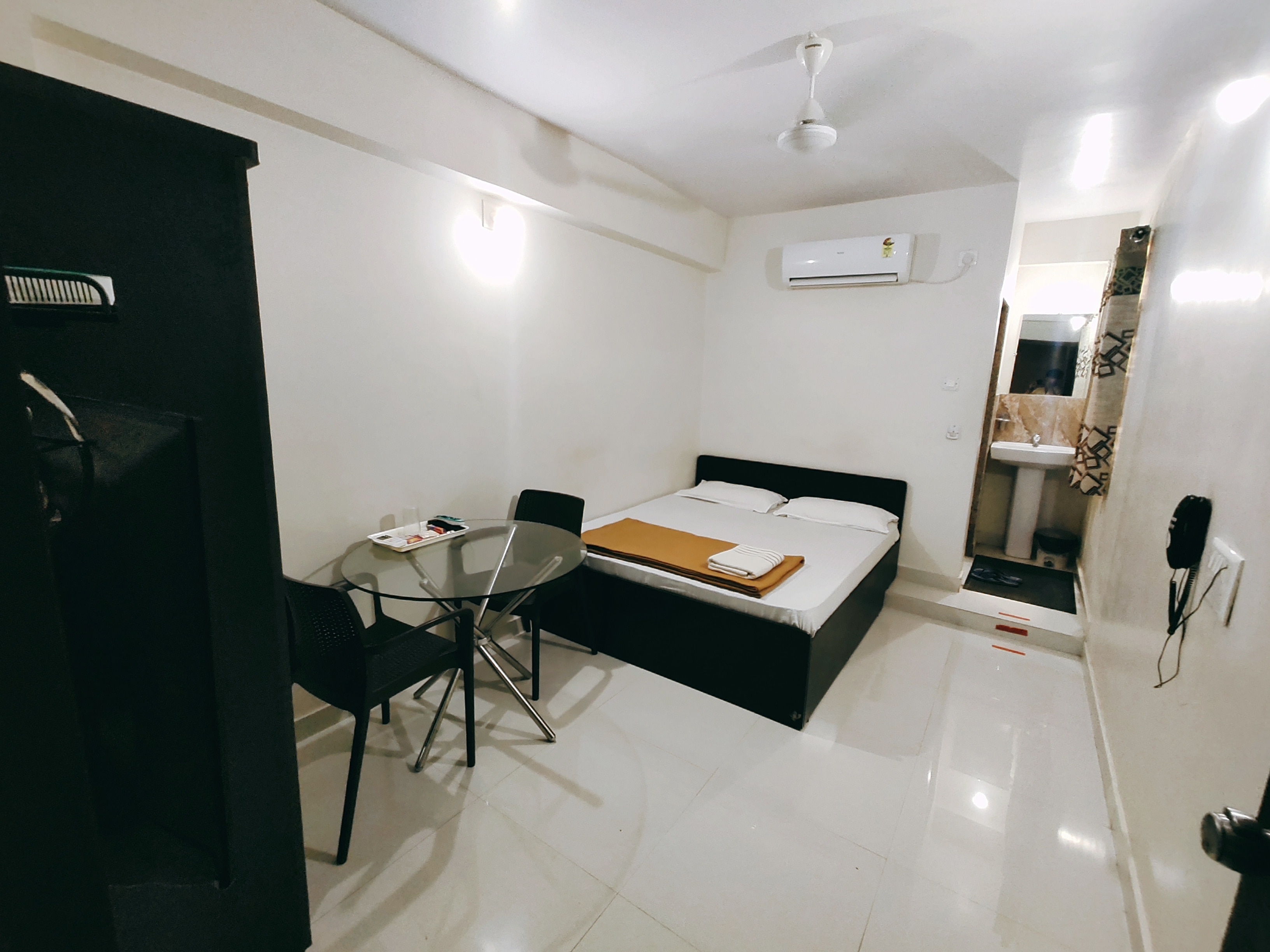 Hotel Rajdhani - Tap to explore photos