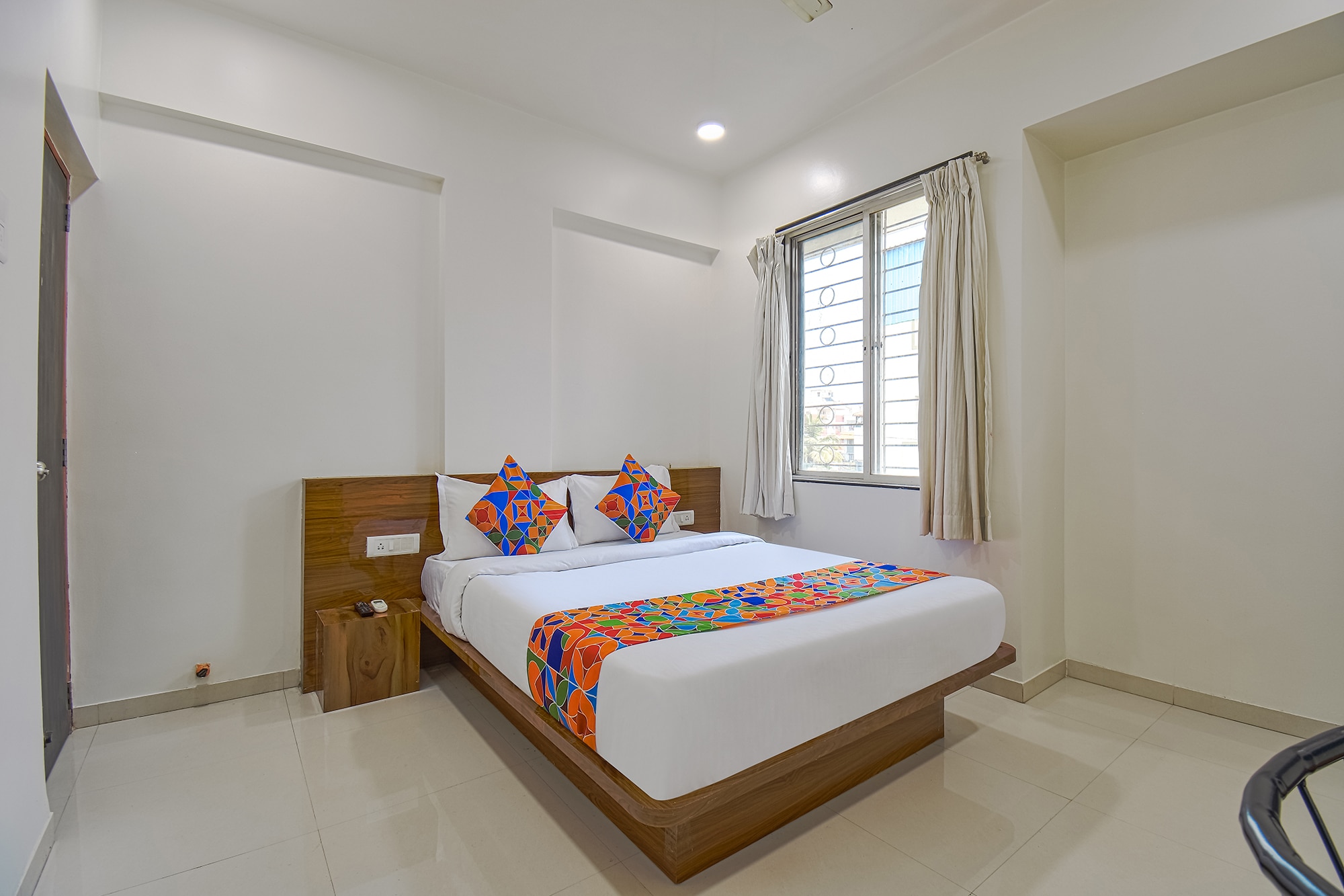 FabHotel Skylight Studio Rooms - Nr. MCF CAMP - Tap to explore photos