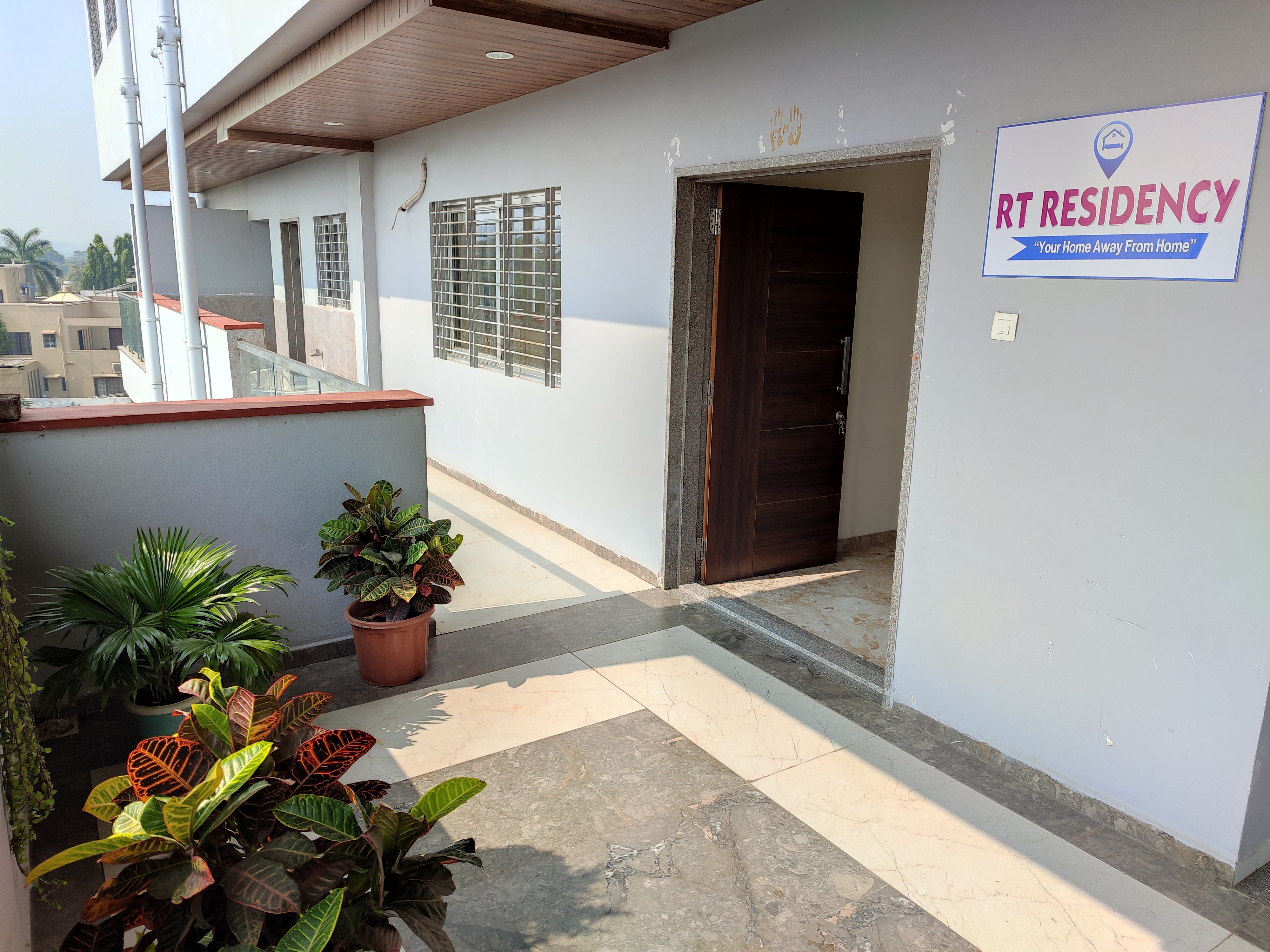 RT RESIDENCY HOTEL AND LODGE - Tap to explore photos