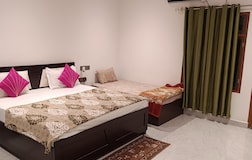 Deluxe Triple bedroom