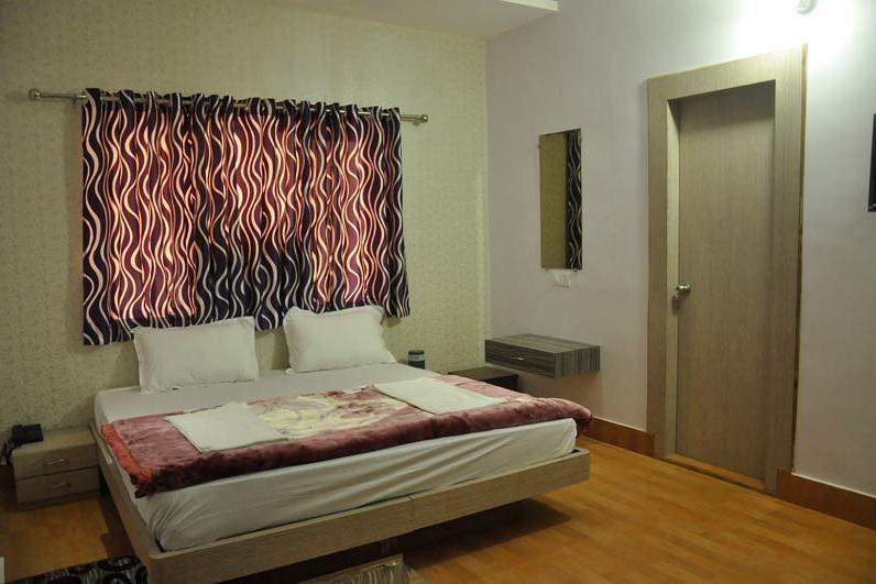 Hotel Rajat Grand - Tap to explore photos