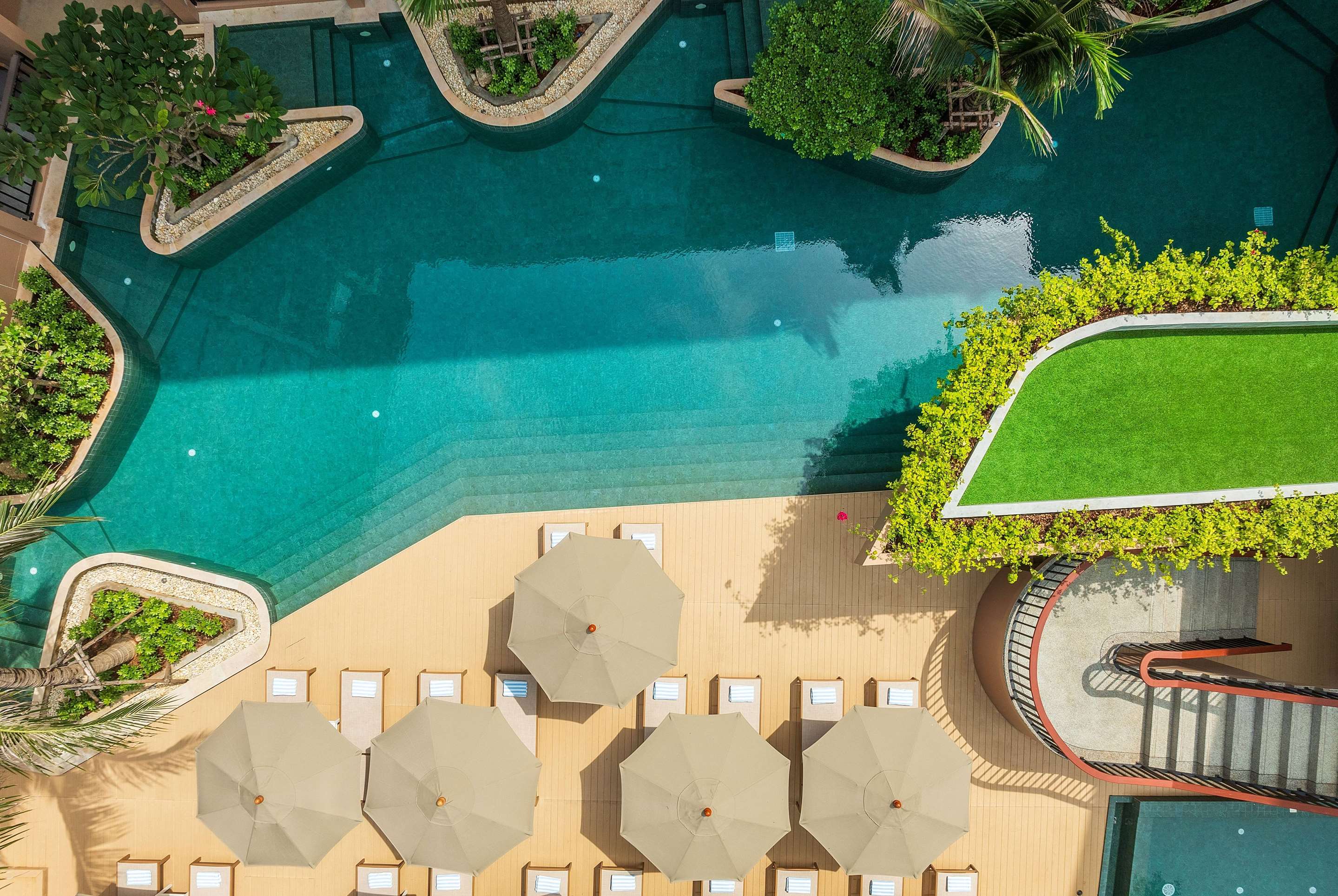 The Proud Karon Beach Phuket Trademark Collection By Wyndham - Tap to explore photos