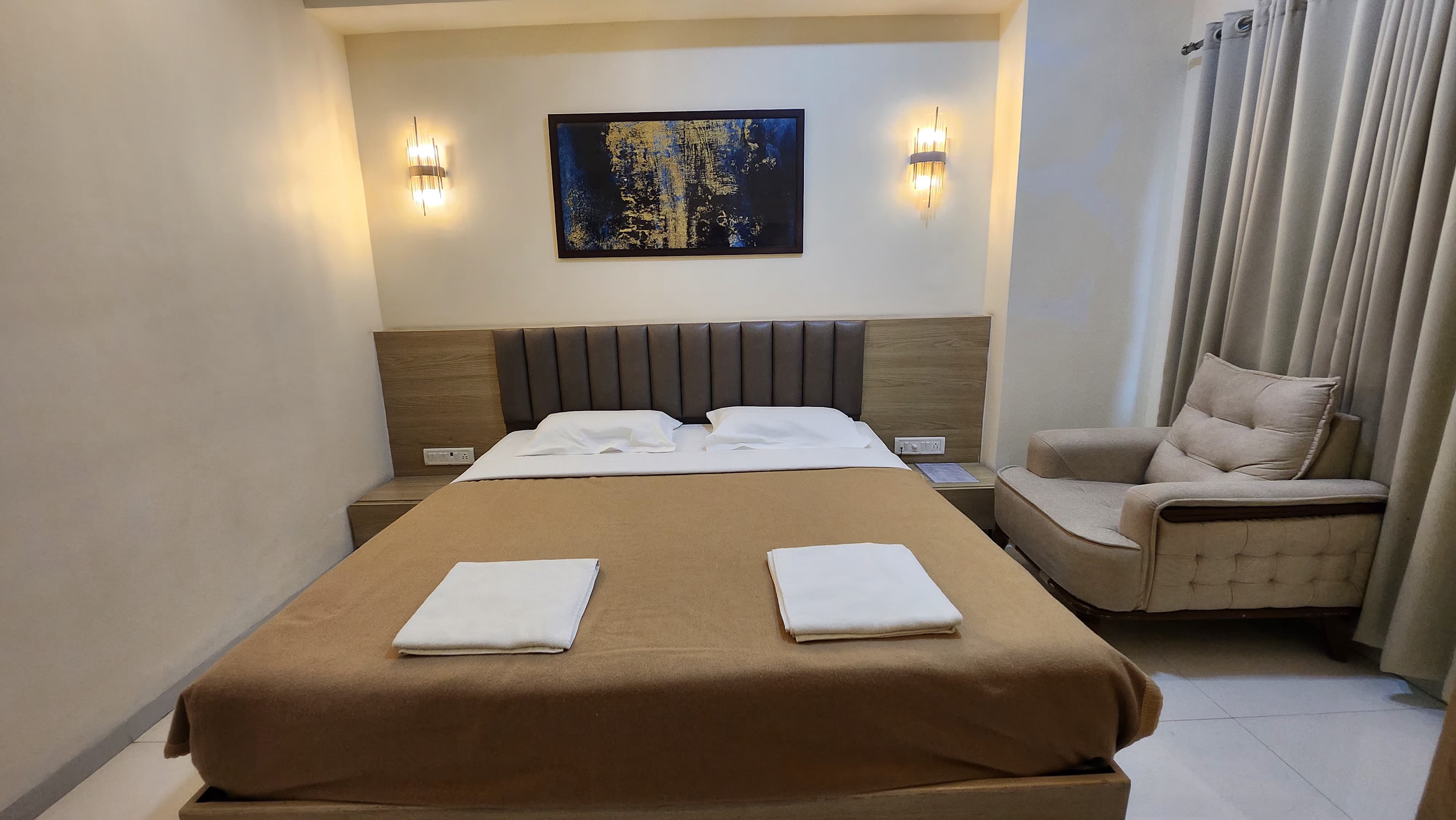 Hotel Blugent Residency - Tap to explore photos