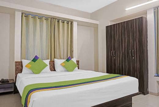 Treebo Diamond Residency - DDPK Inn