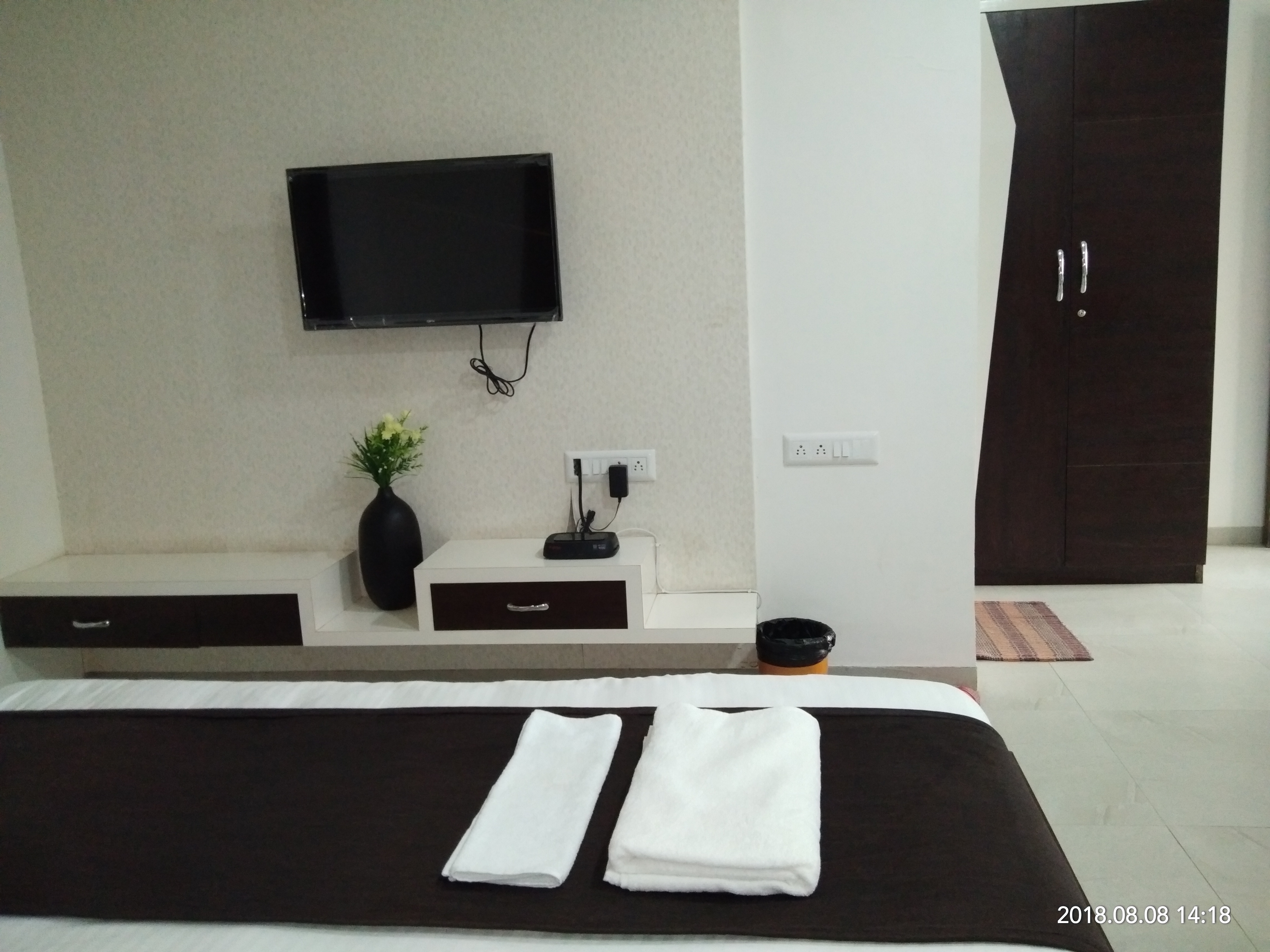 Fourth Dimension Service Apartments - Tap to explore photos