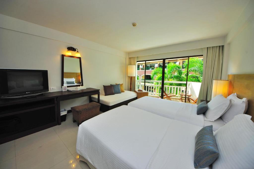 Ramada by Wyndham Phuket Southsea - Tap to explore photos