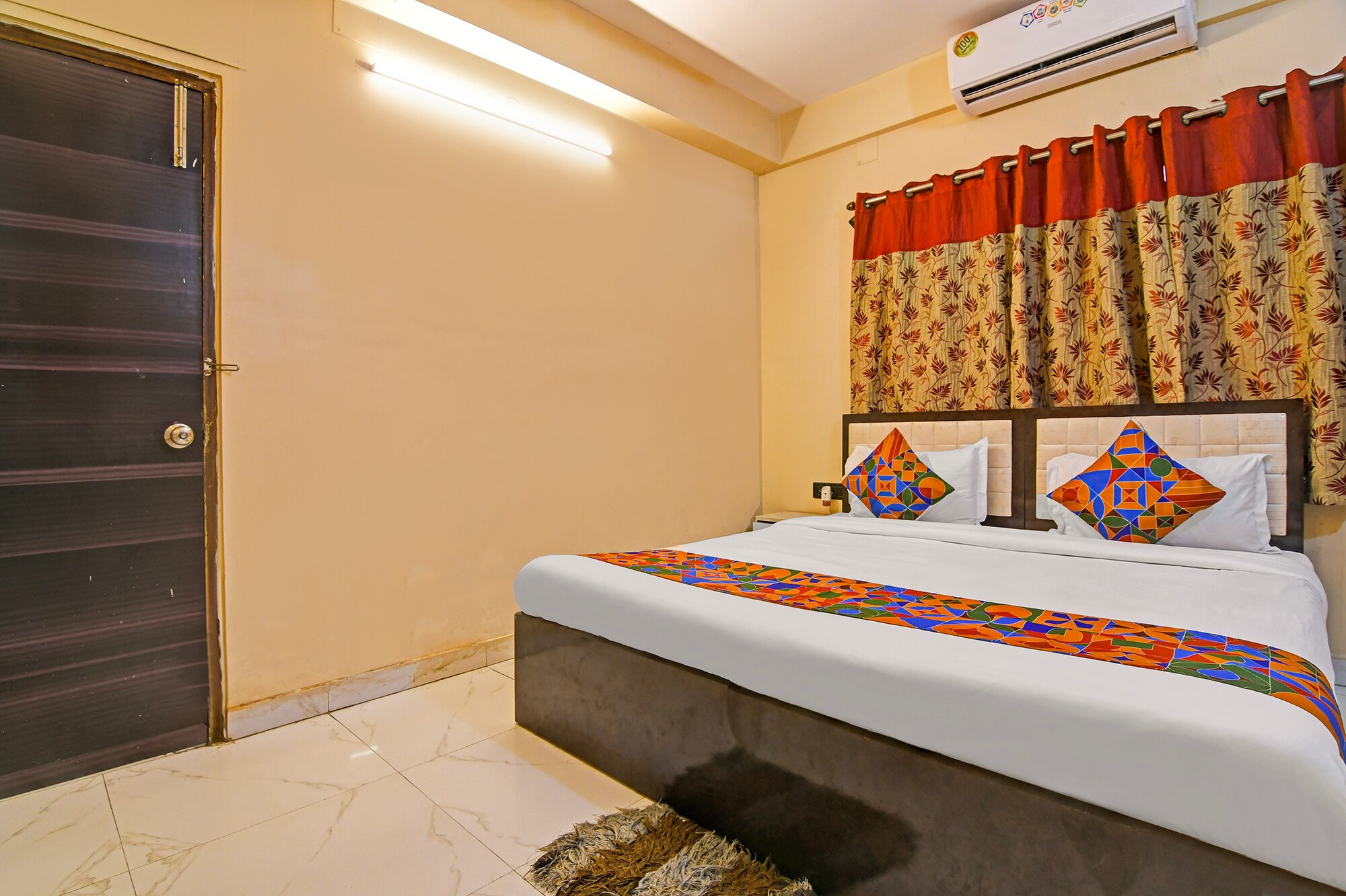 FabHotel Casa Inn - Near Bisarjan Ghat - Tap to explore photos