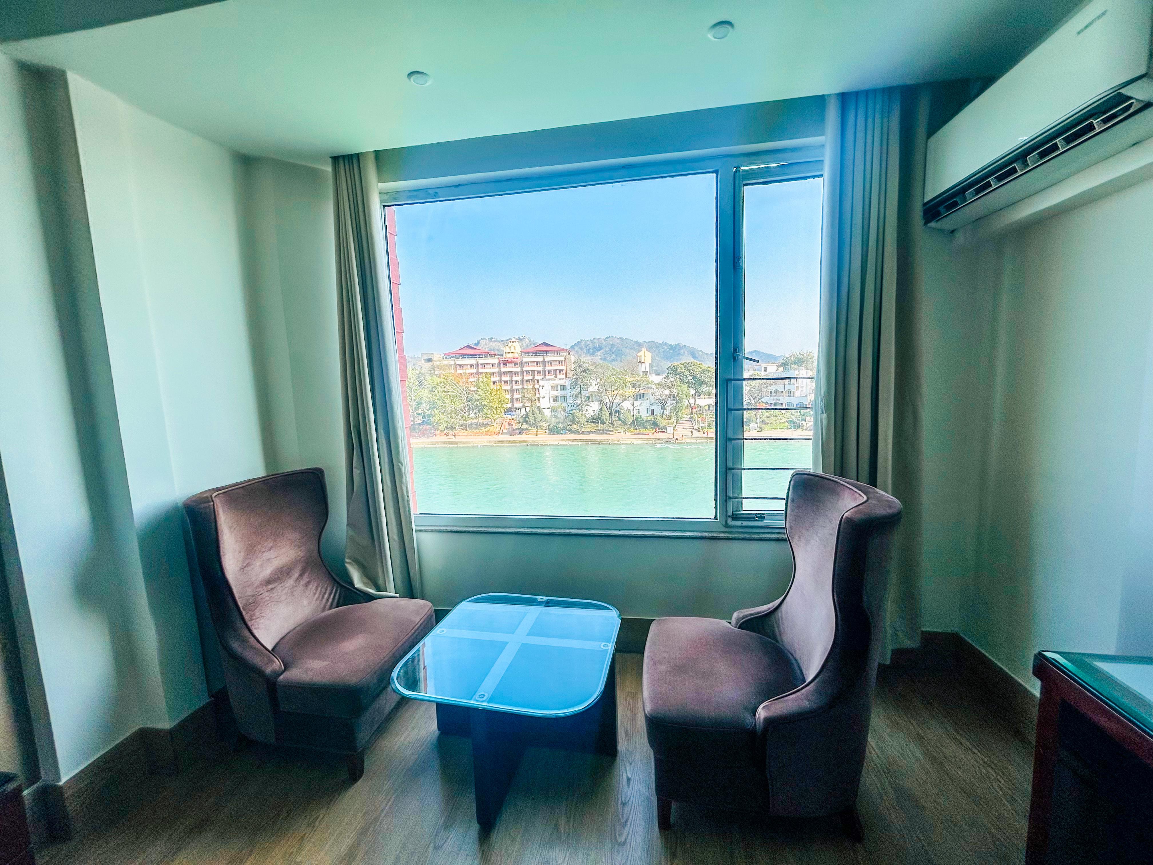 GANGA EXOTICA - A Riverside Boutique Hotel - Tap to explore photos