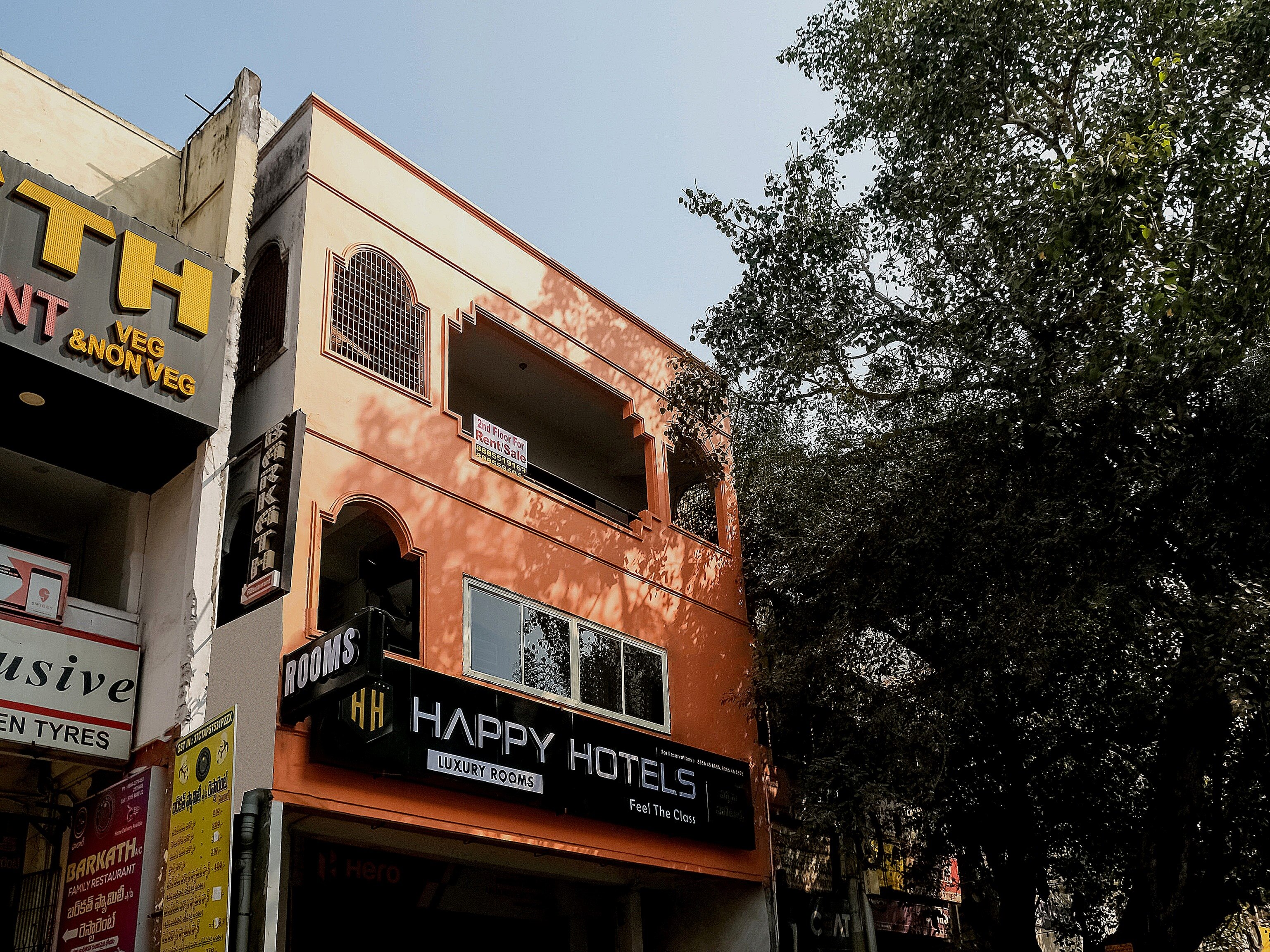 Hotel O Happy Hotels - Tap to explore photos