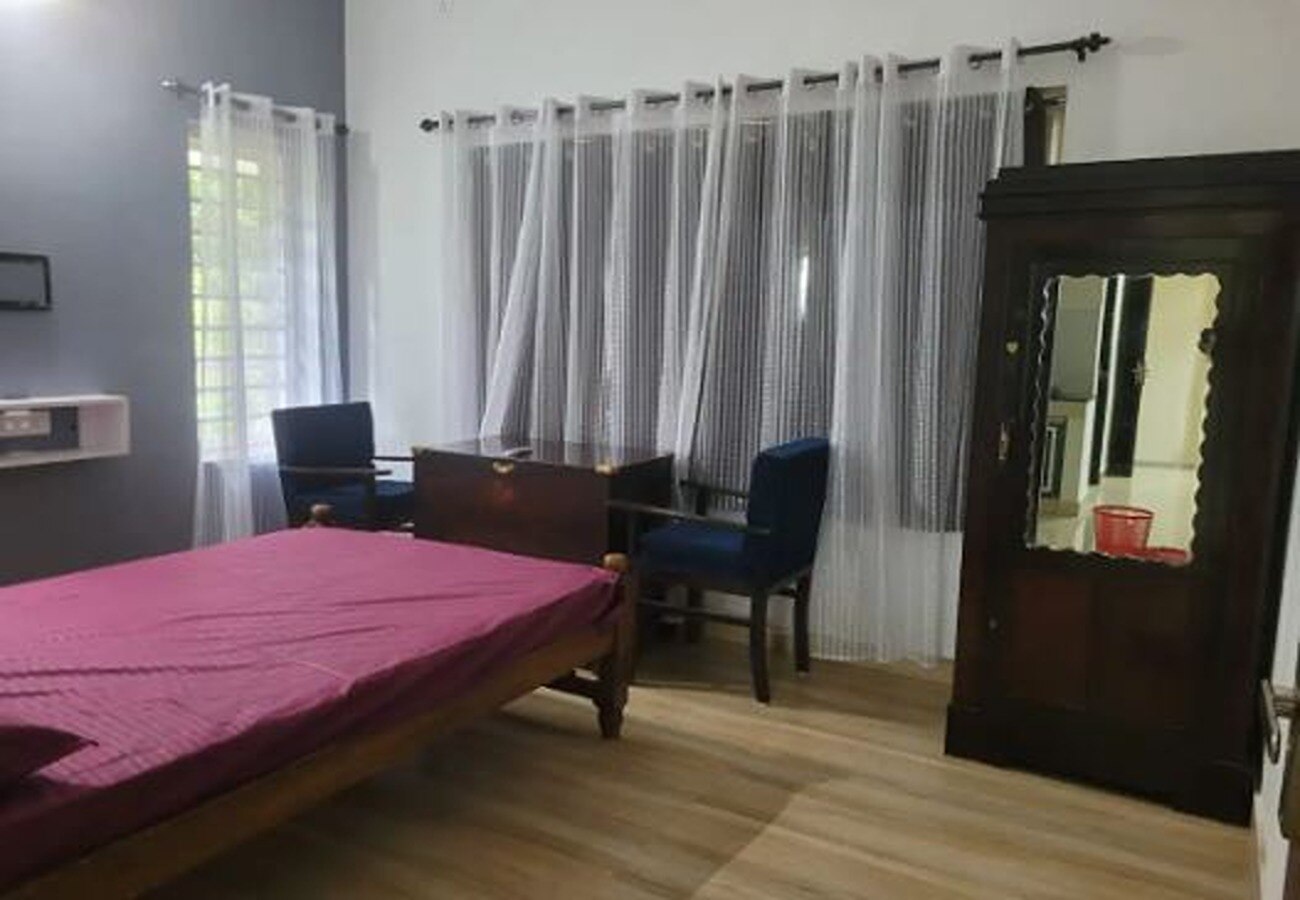 Room in a villa Near Kovalam - Tap to explore photos