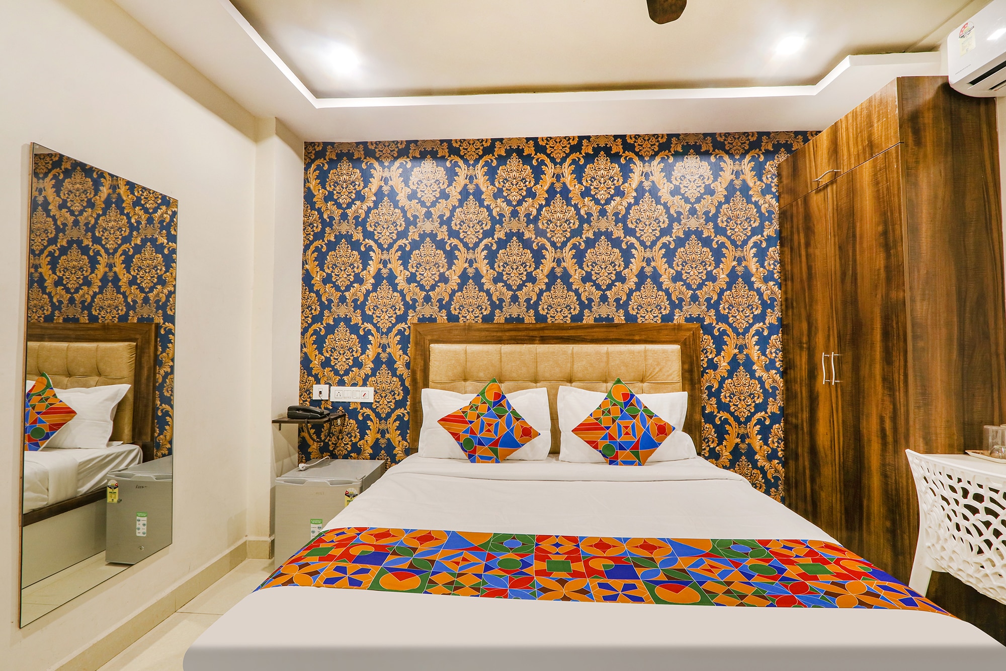 FabHotel The Sunrise Inn - Nr. Gayatri Vidya Parishad College of Engineering - Tap to explore photos