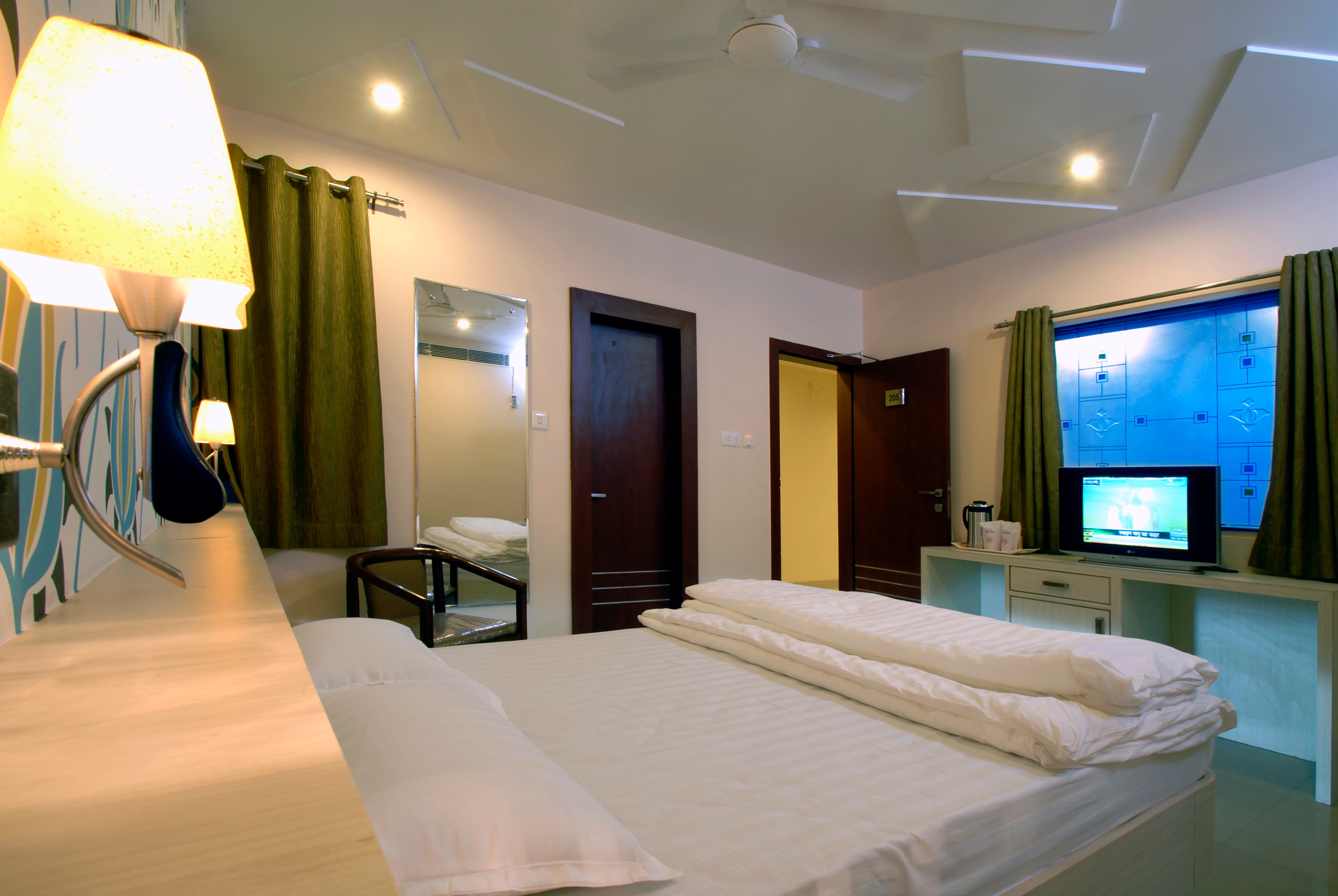 Hotel Tulsi Exotic  - Tap to explore photos