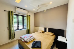Club Homes Grand Retreat | Cosy Rooms, Alathur