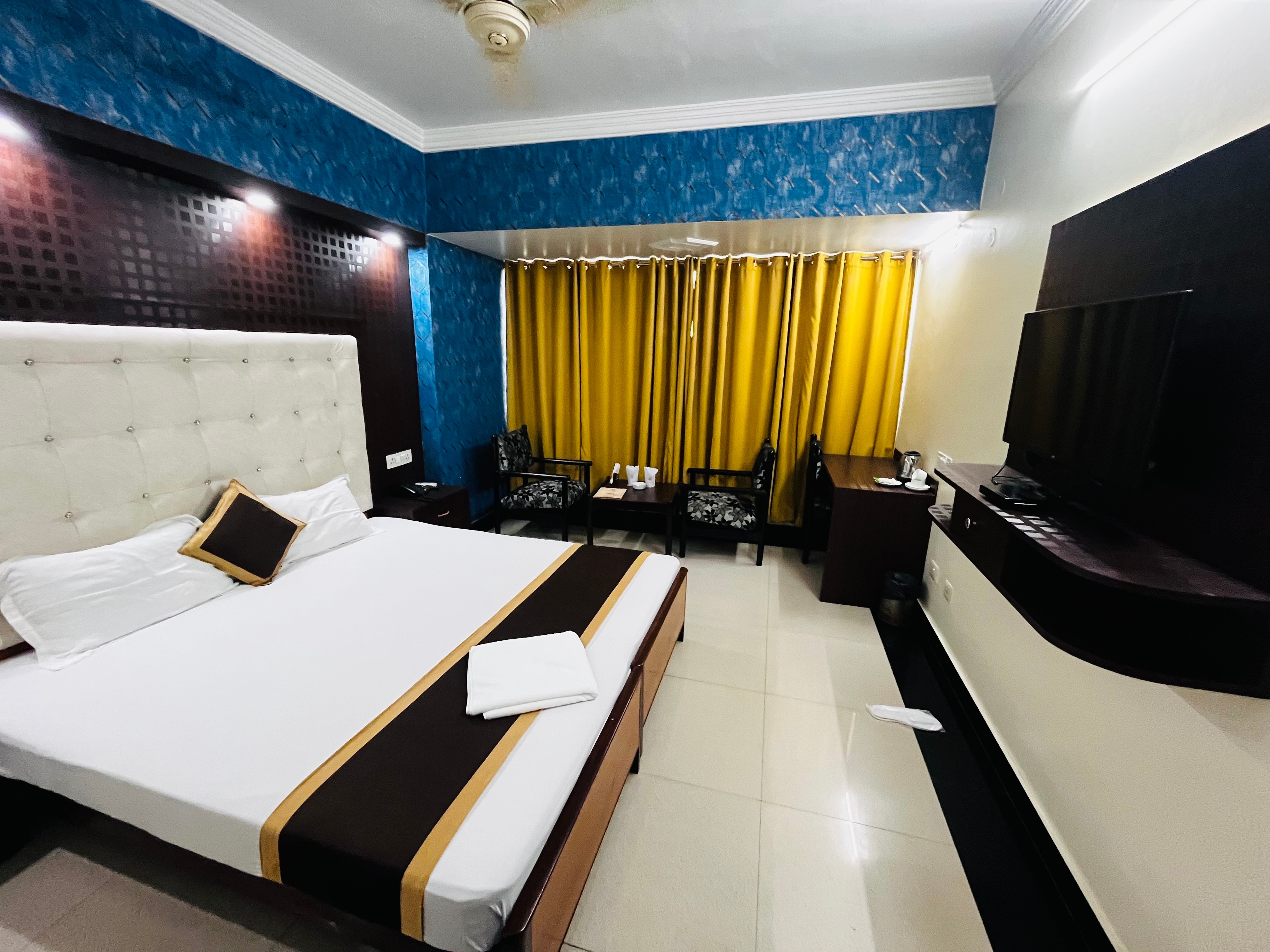 Hotel Rajhans International  - Tap to explore photos