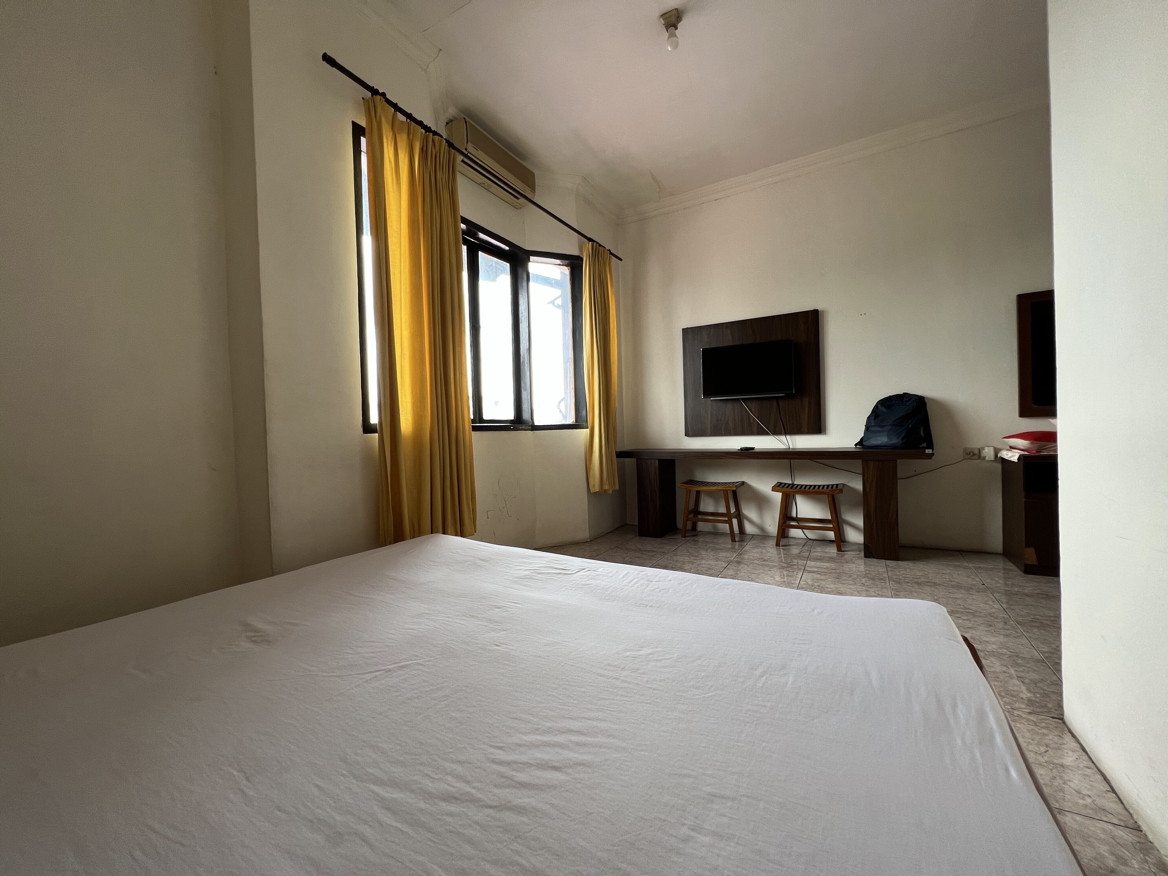 OYO 92098 Kost Orange Syariah - Tap to explore photos