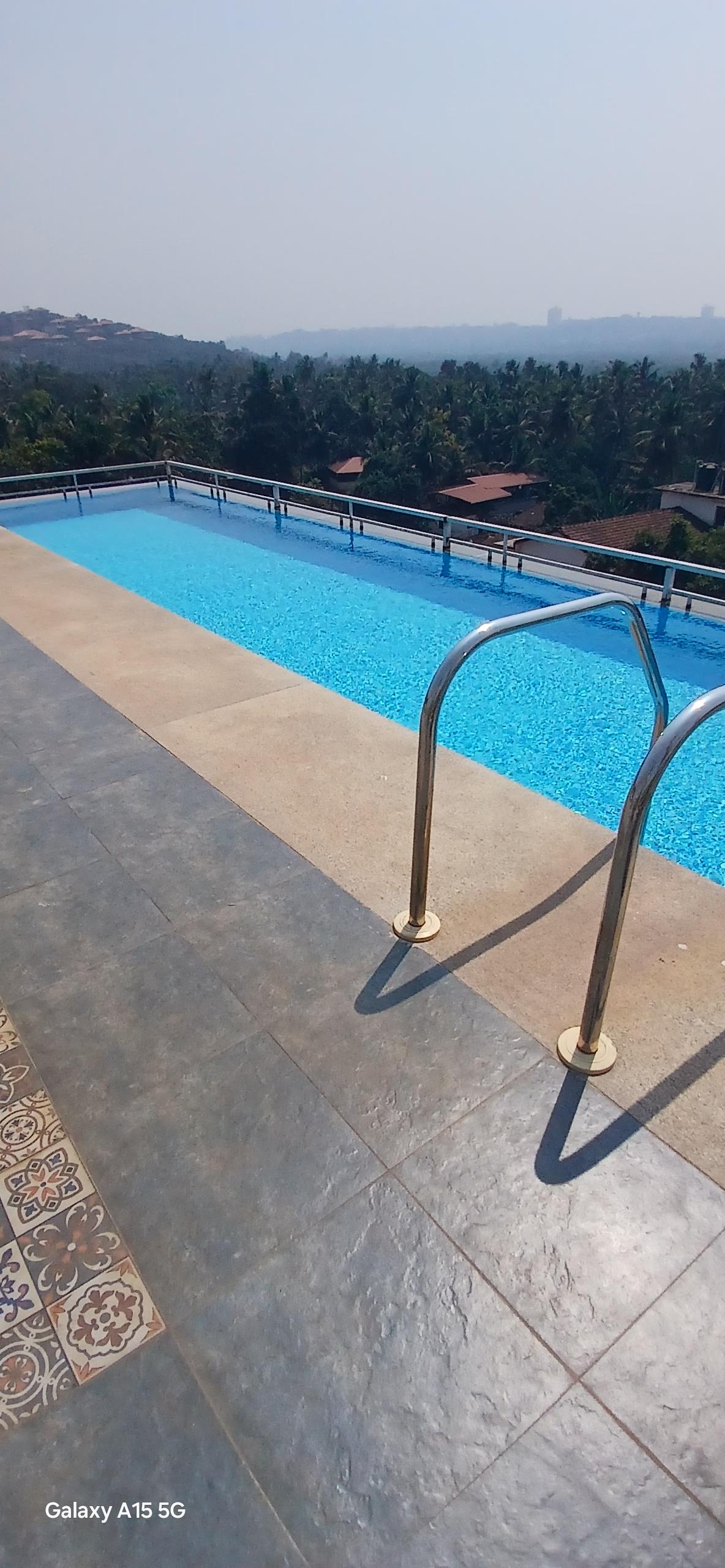 Couple Friendly suite 305 1BHK with Infinity Pool - Tap to explore photos