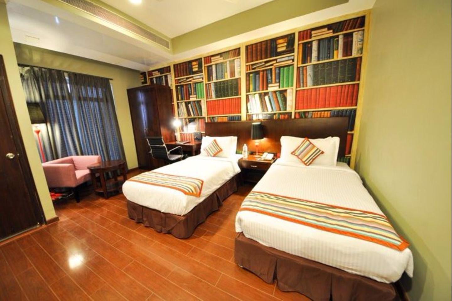 The Travotel Suites - Tap to explore photos