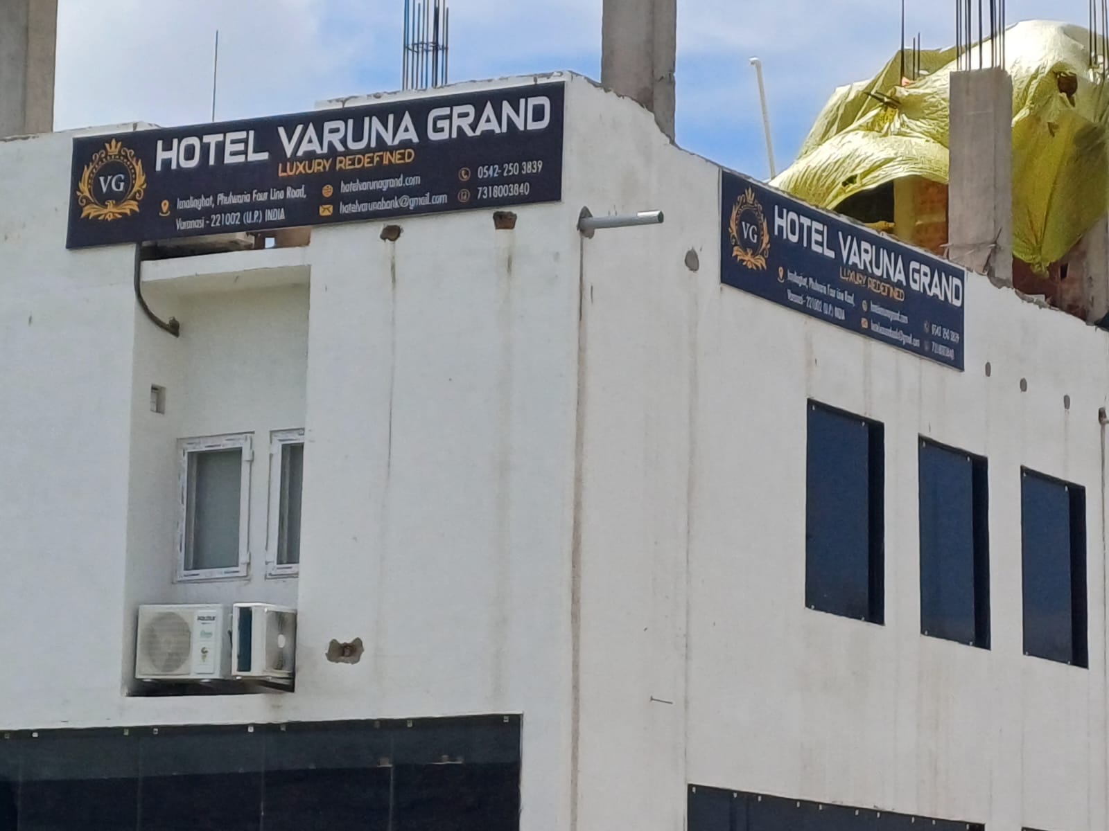 Hotel Varuna Grand - Tap to explore photos