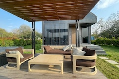 Bankroft 1 | Cozy Luxury cabin with Outdoor Jacuzzi in Hyderabad by Homeyhuts, Chevella