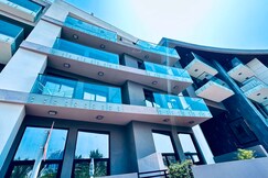 Premium Holiday Apartment at La Perla JVC with Pool & Gym, Dubai