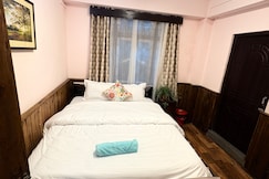 Cozy wooden room with attached washroom, Darjeeling