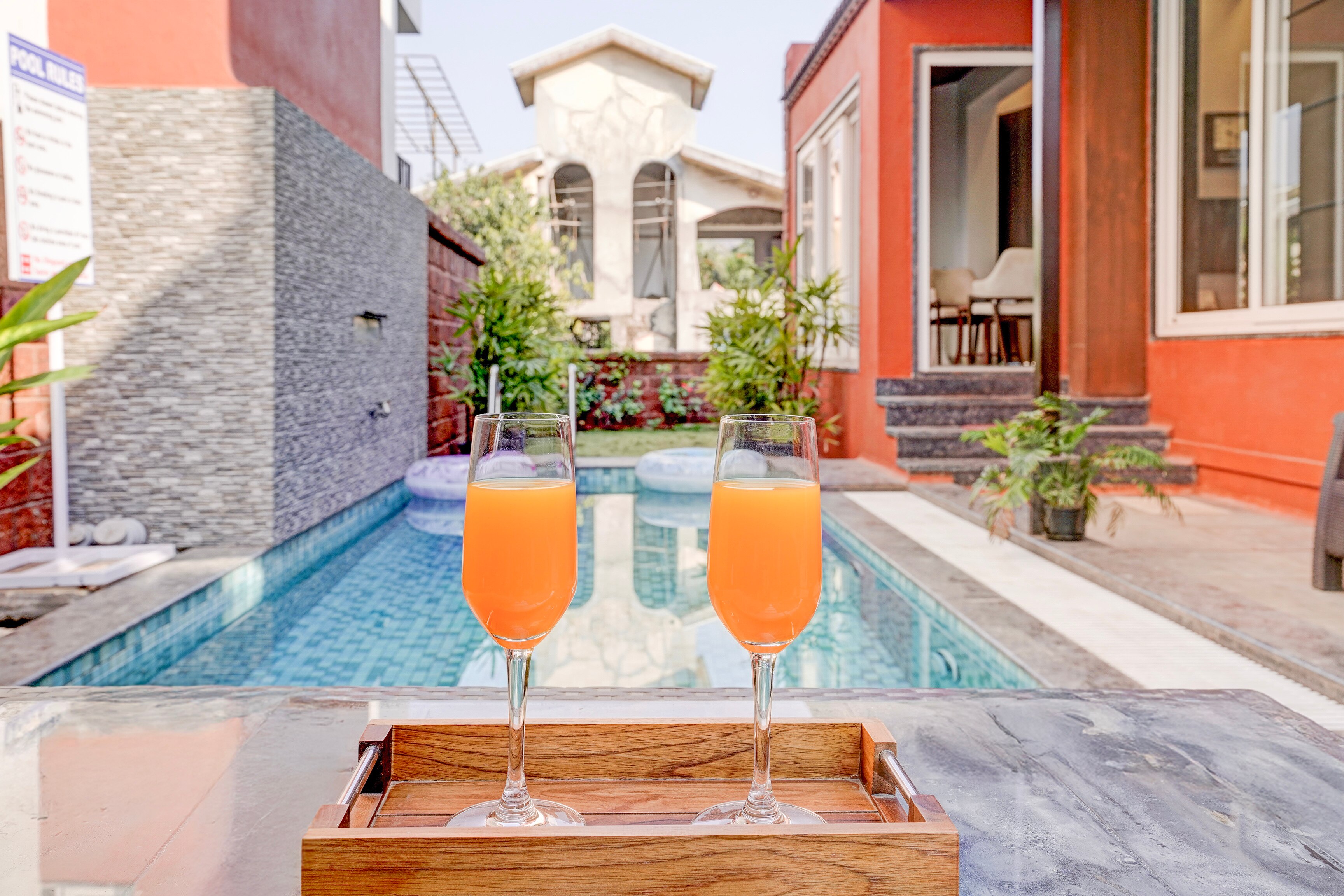ELIVAAS Irene Ruby | Serene 6BHK Retreat with Private Pools, Gardens, and Balconies - Tap to explore photos