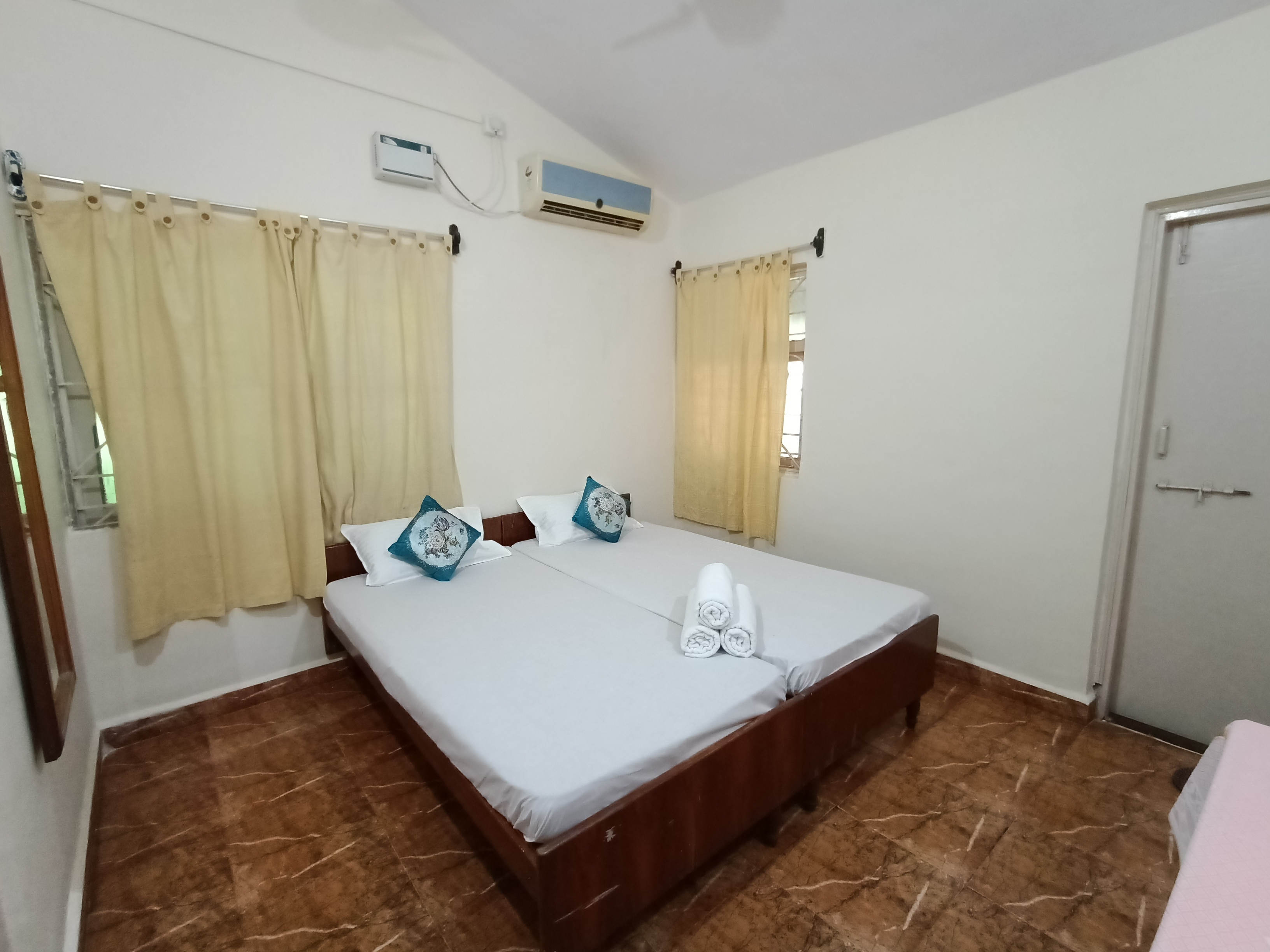 Marlin Guest House on Tito's Lane - Tap to explore photos