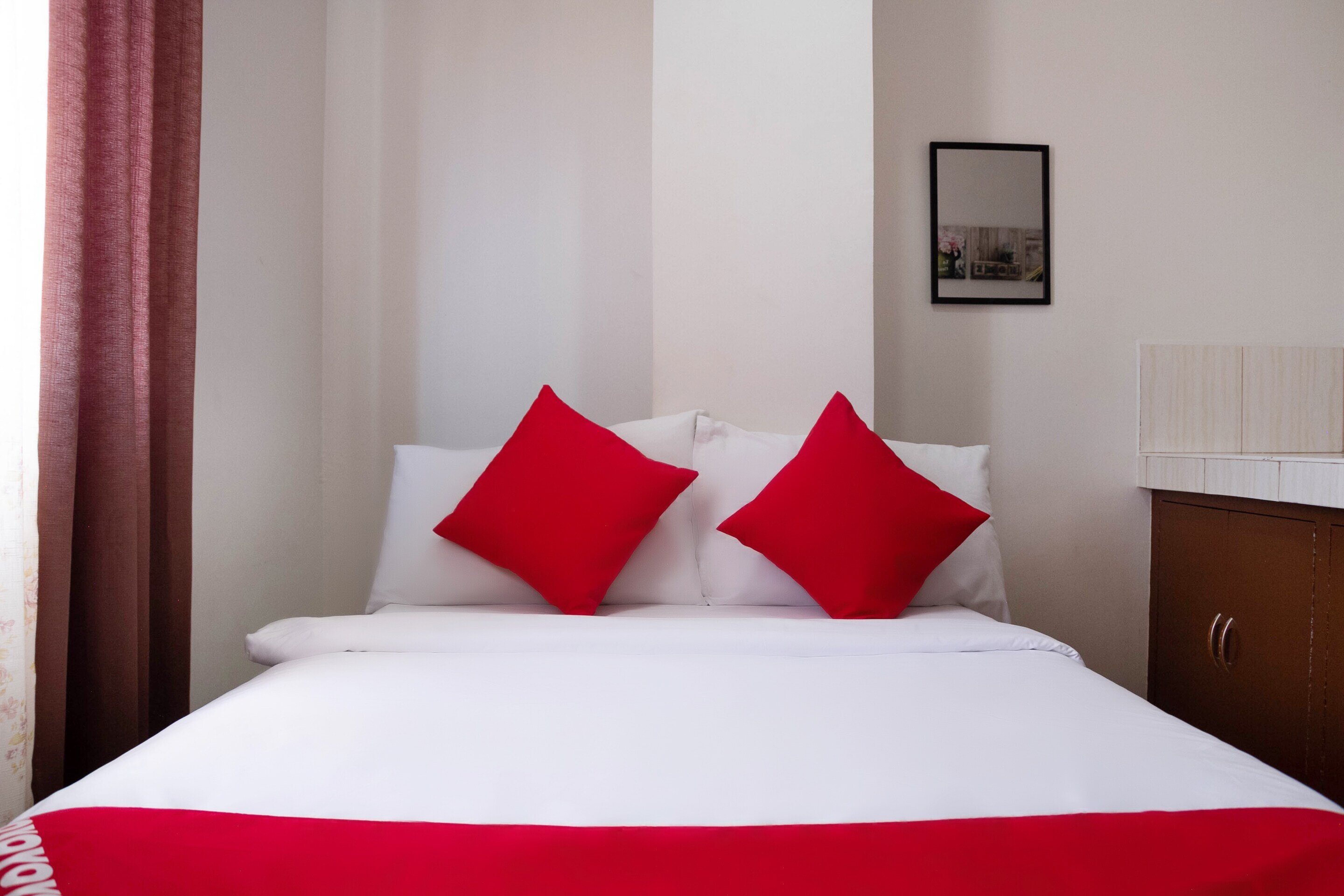 OYO 163 Goldentown Hotel And Residences - Tap to explore photos